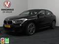 BMW X2 sDrive18i High Executive | M-Pakket! | Navigatie | Zwart - thumbnail 1