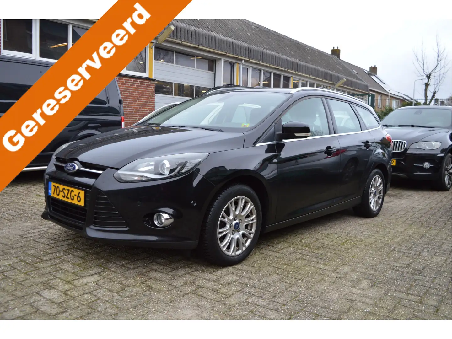 Ford Focus Wagon 1.6 EcoBoost Lease Titanium NL-auto / Clima Schwarz - 1