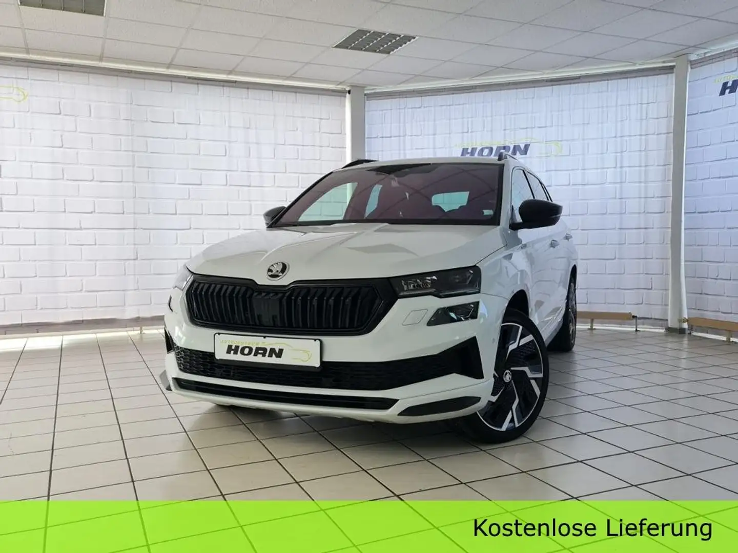 Skoda Karoq Sportline 4x4, AHK, Pano, Kamera, LED, Navi,1.Hand Weiß - 1