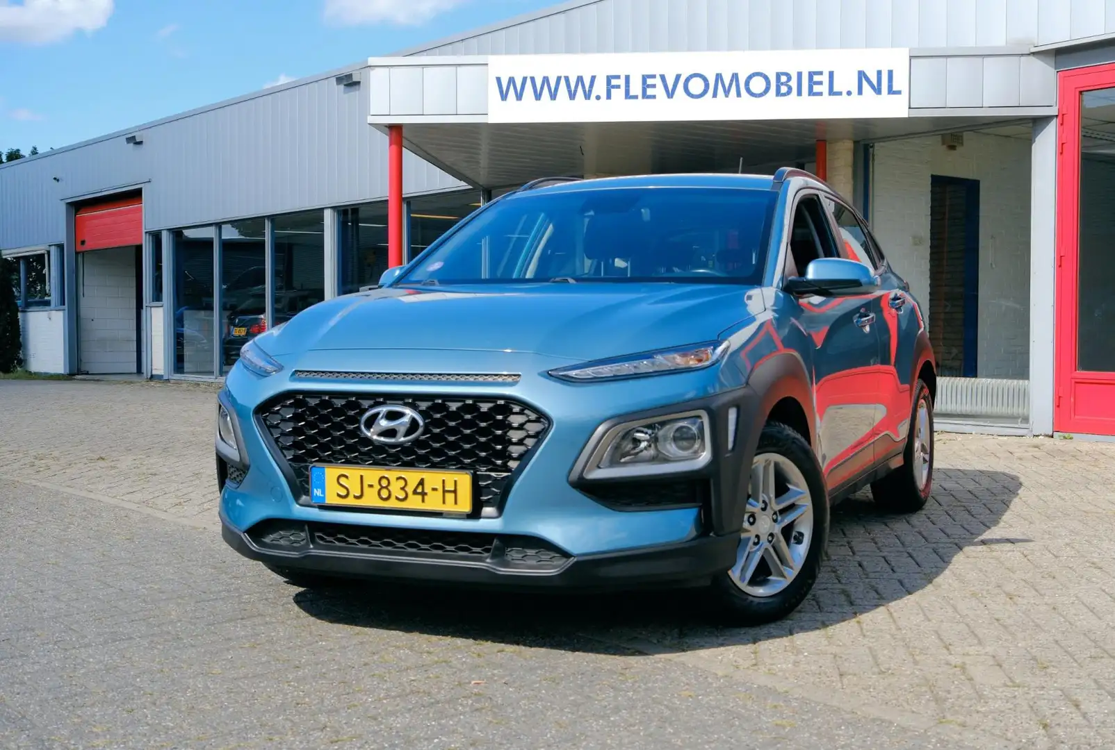 Hyundai KONA 1.0T Comfort Clima|Apple Carplay|LMV|PDC|DAB+ Blauw - 1