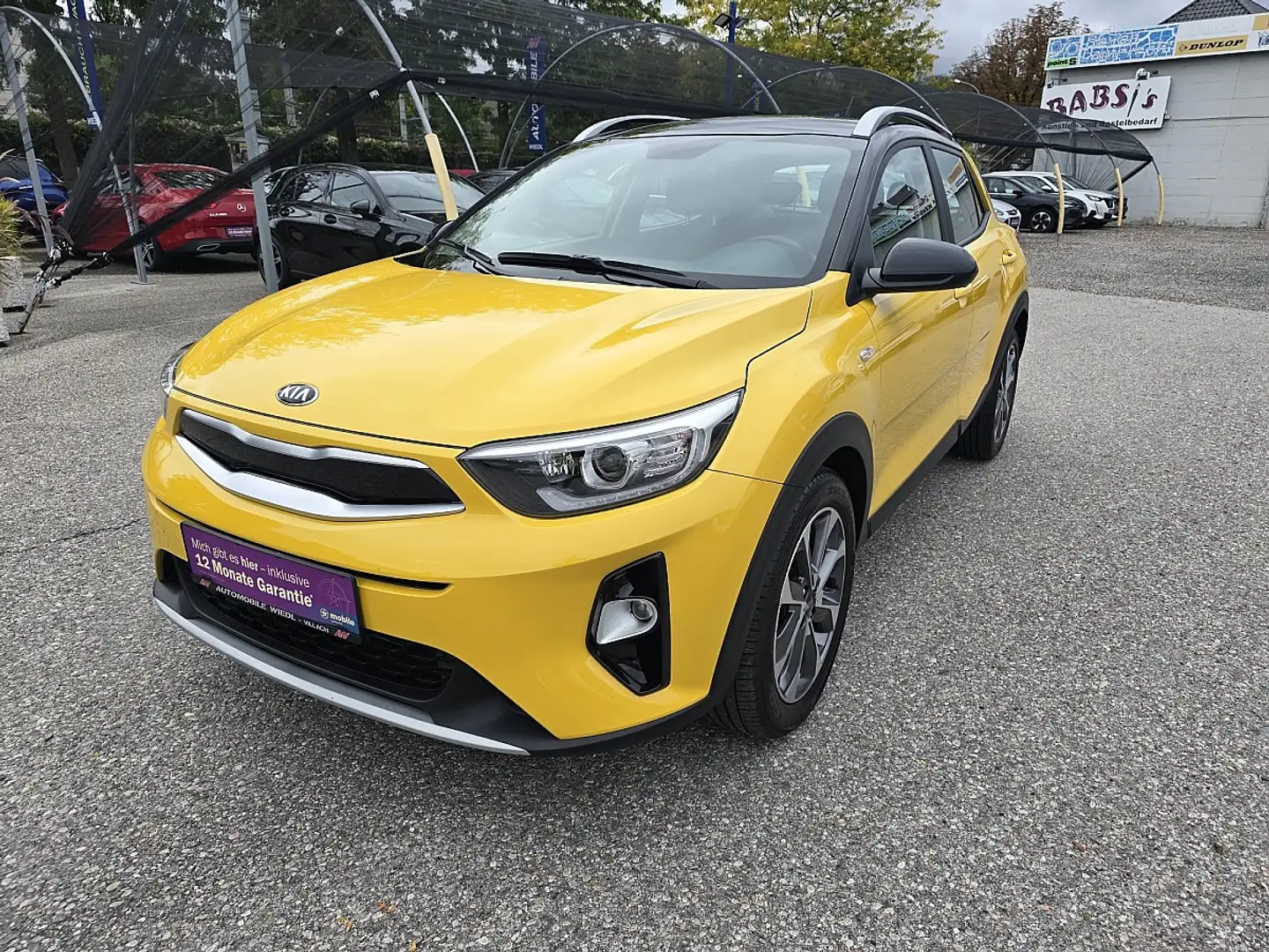 Kia Stonic 1,0 TGDI GPF ISG Silber Gelb - 1