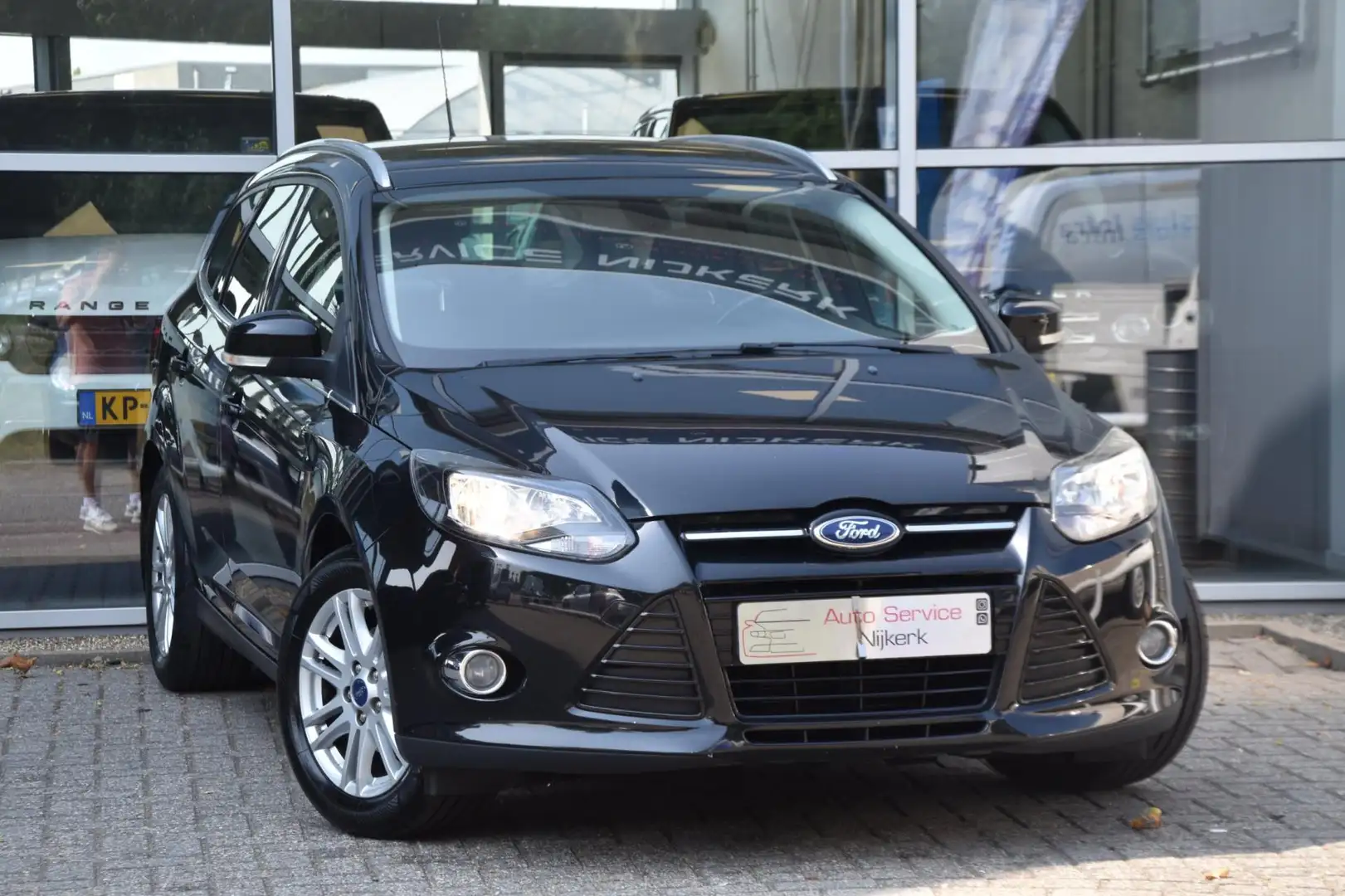 Ford Focus Wagon 1.0 EcoBoost Titanium airco Navi. Pdc Trekha Noir - 1
