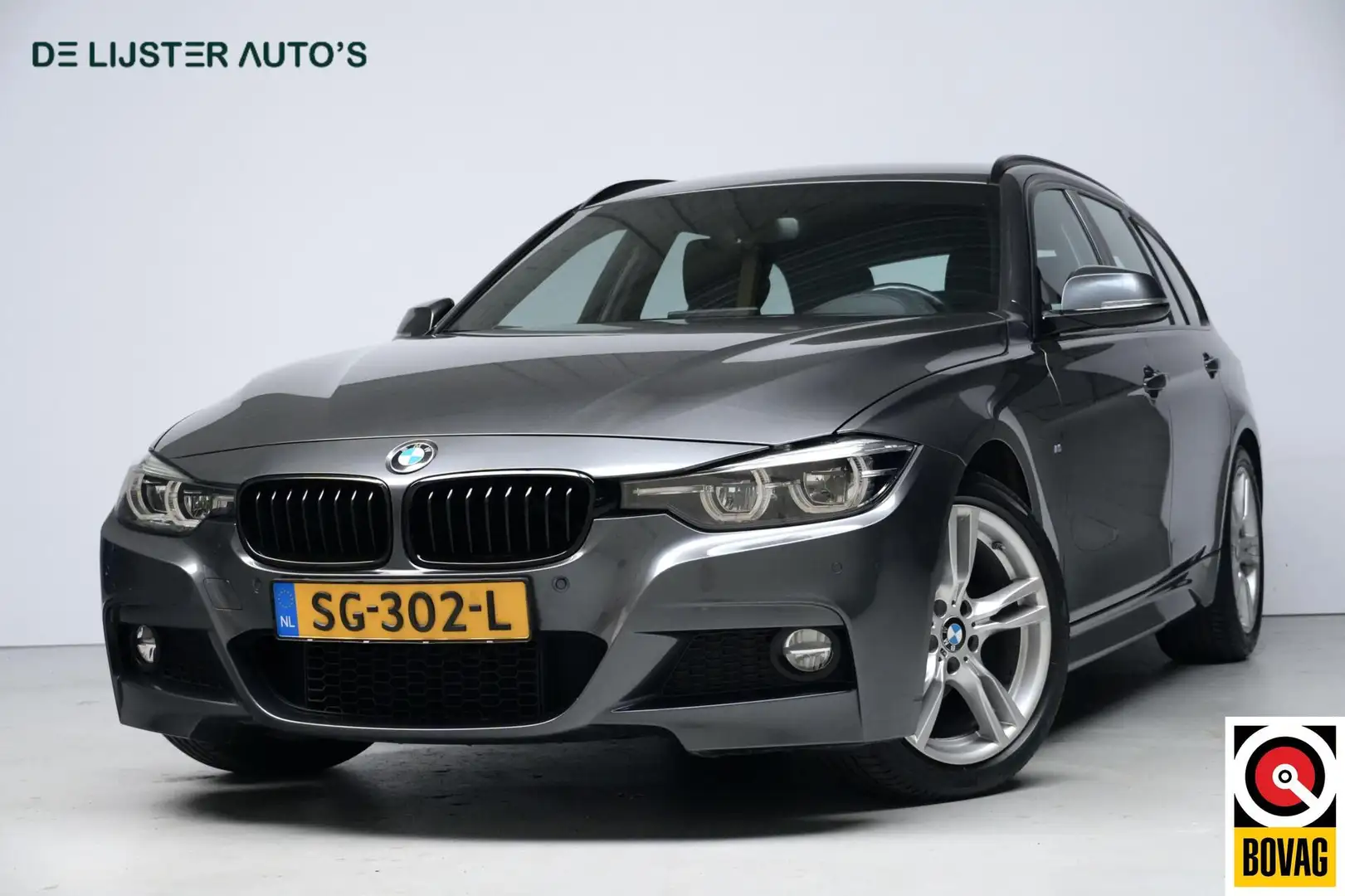 BMW 320 3-serie Touring 320i M Sport High Executive Automa Grijs - 1