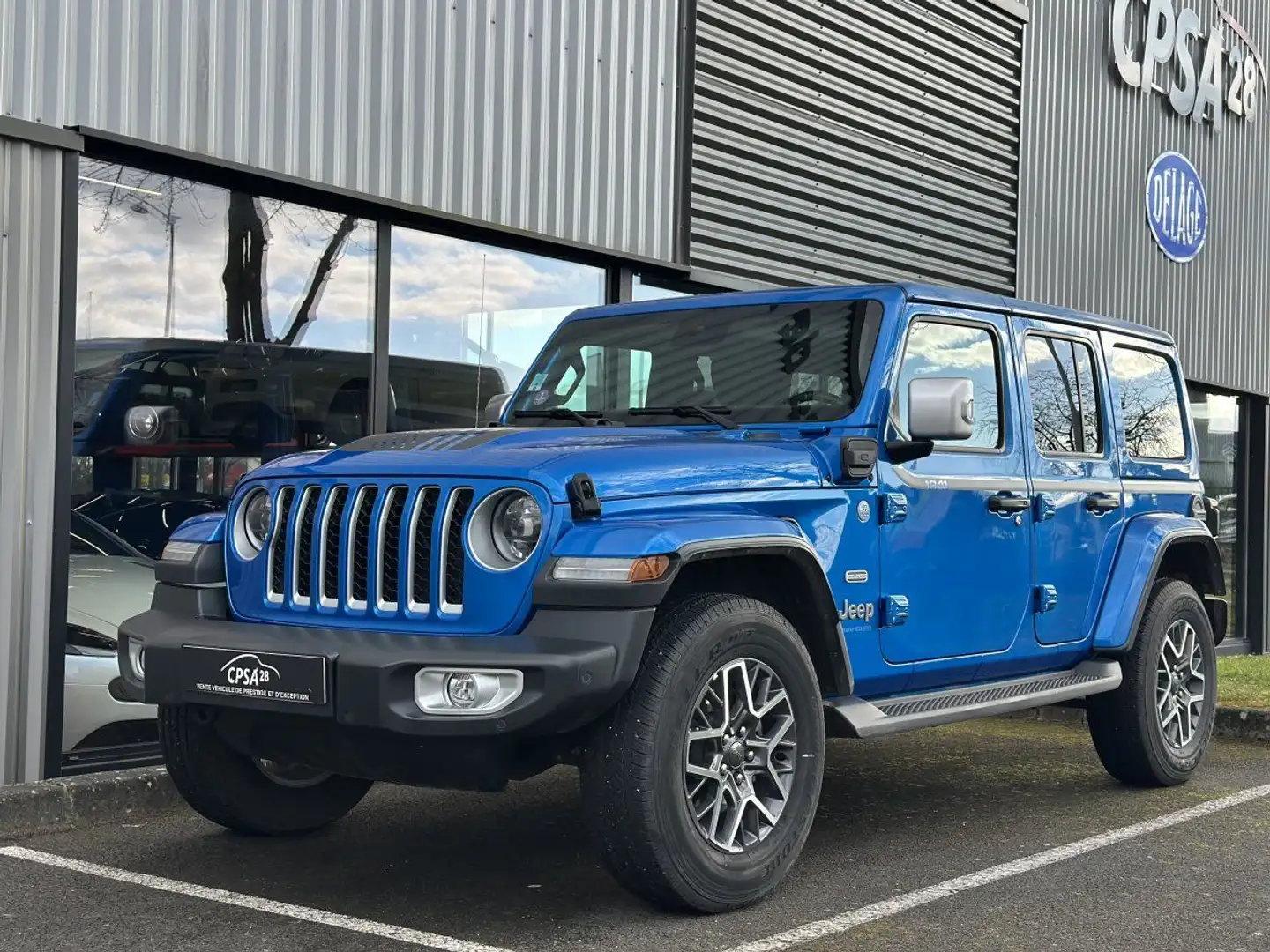 Jeep Wrangler IV (2) UNLIMITED 4XE 2.0 L T 380 PHEV 4X4 BVA8 OVERLAND Bleu - 1