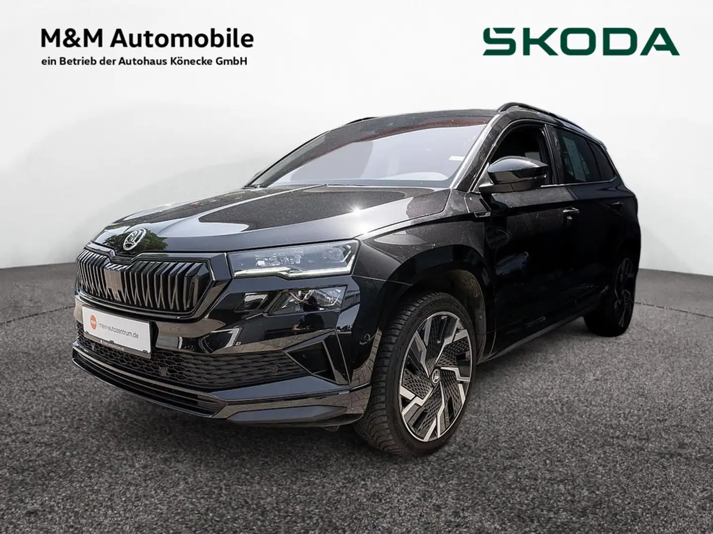 Skoda Karoq 2.0 TSI Sportline 4x4 AHK Kamera ACC Na Noir - 1