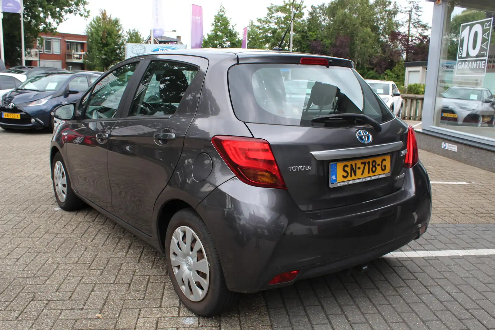Toyota Yaris 1.5 Hybrid Lease Limited AFN.TREKHAAK CLIMA CRUISE Grijs - 2