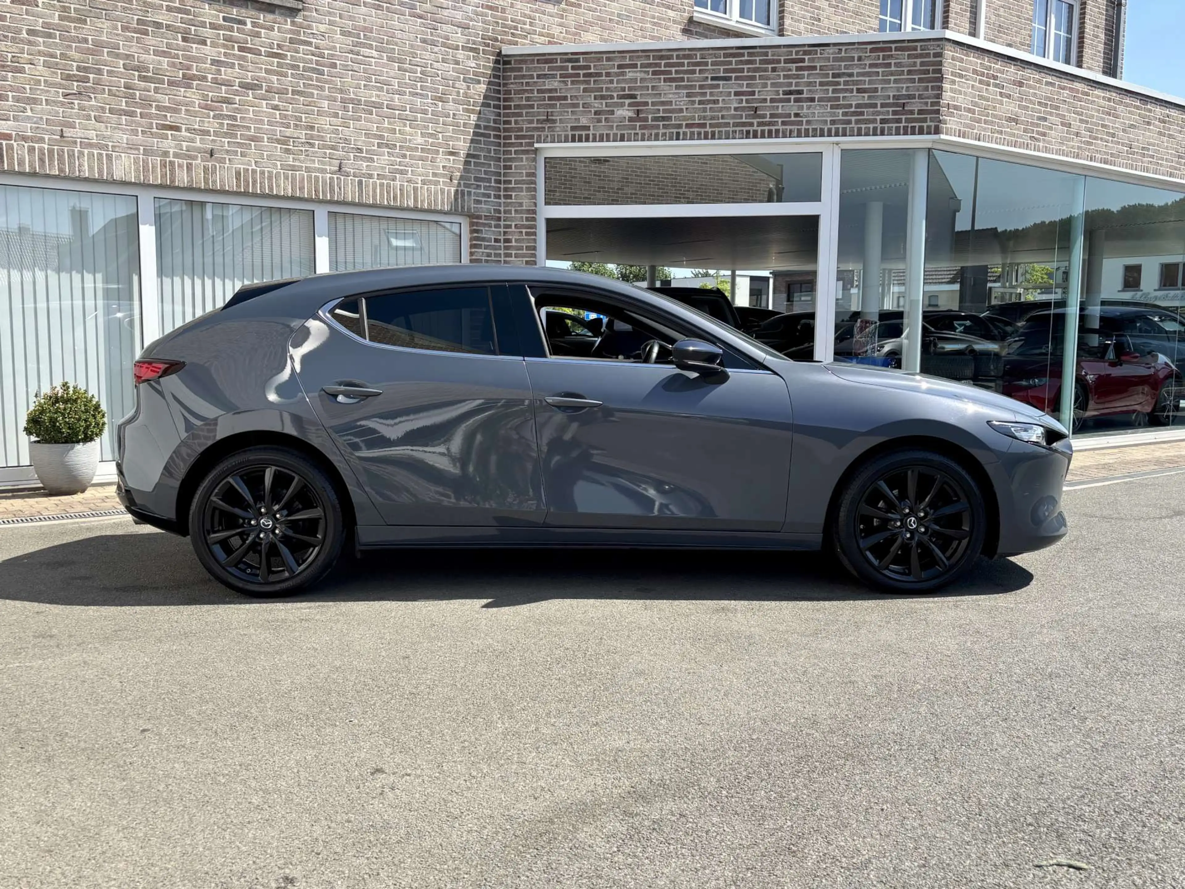 Mazda 3 3 2.0 M-HYBRID HOMURA (150pk) / 33000km / 12m wb — photo 6