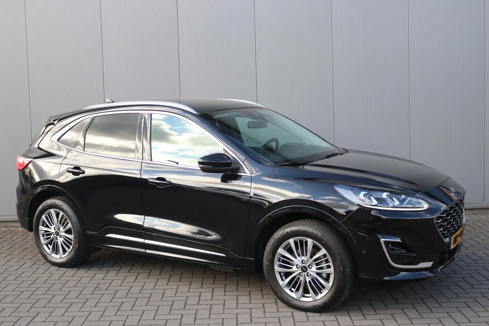 Ford Kuga 2.5 PHEV Vignale Elektr.trekhaak/Open-dak/Winter-p Zwart - 2