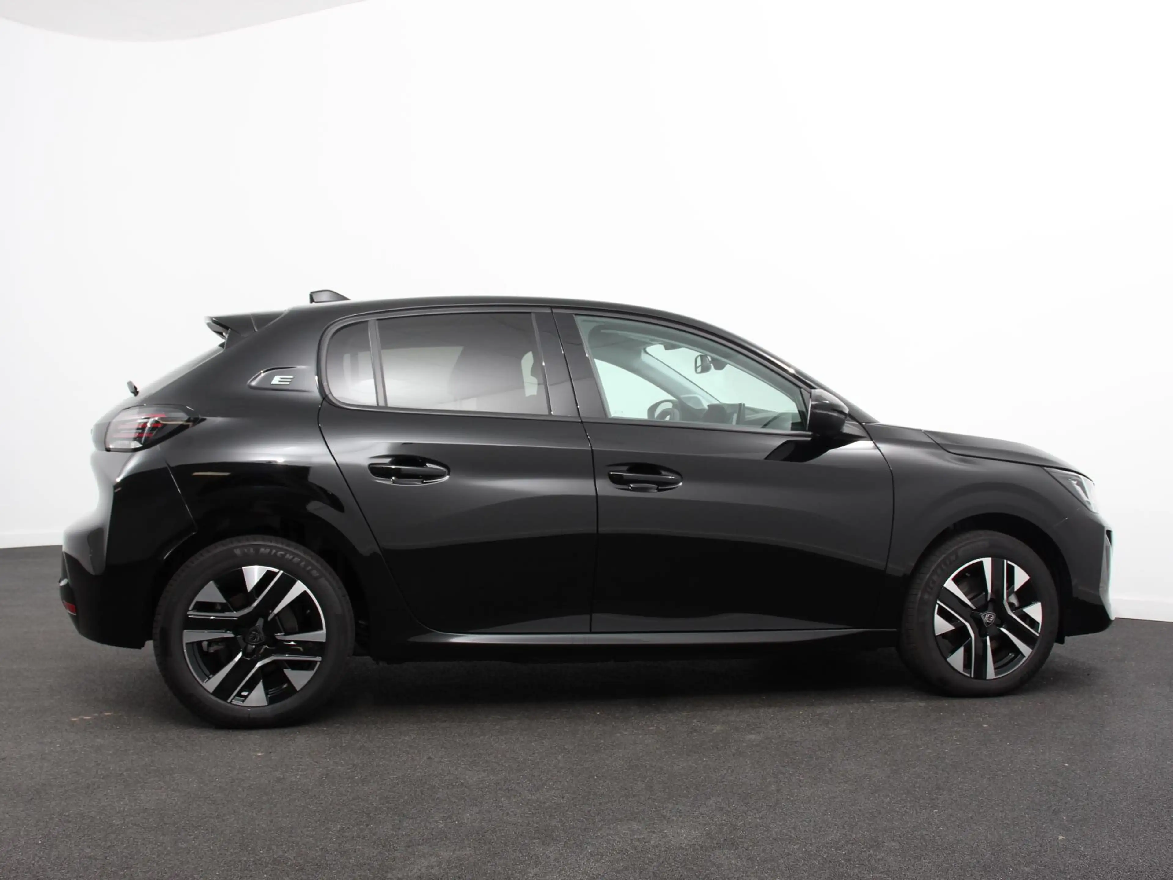 Peugeot e-208 EV Allure Pack 50 kWh Warmtepomp Navigatie Apple C — photo 6