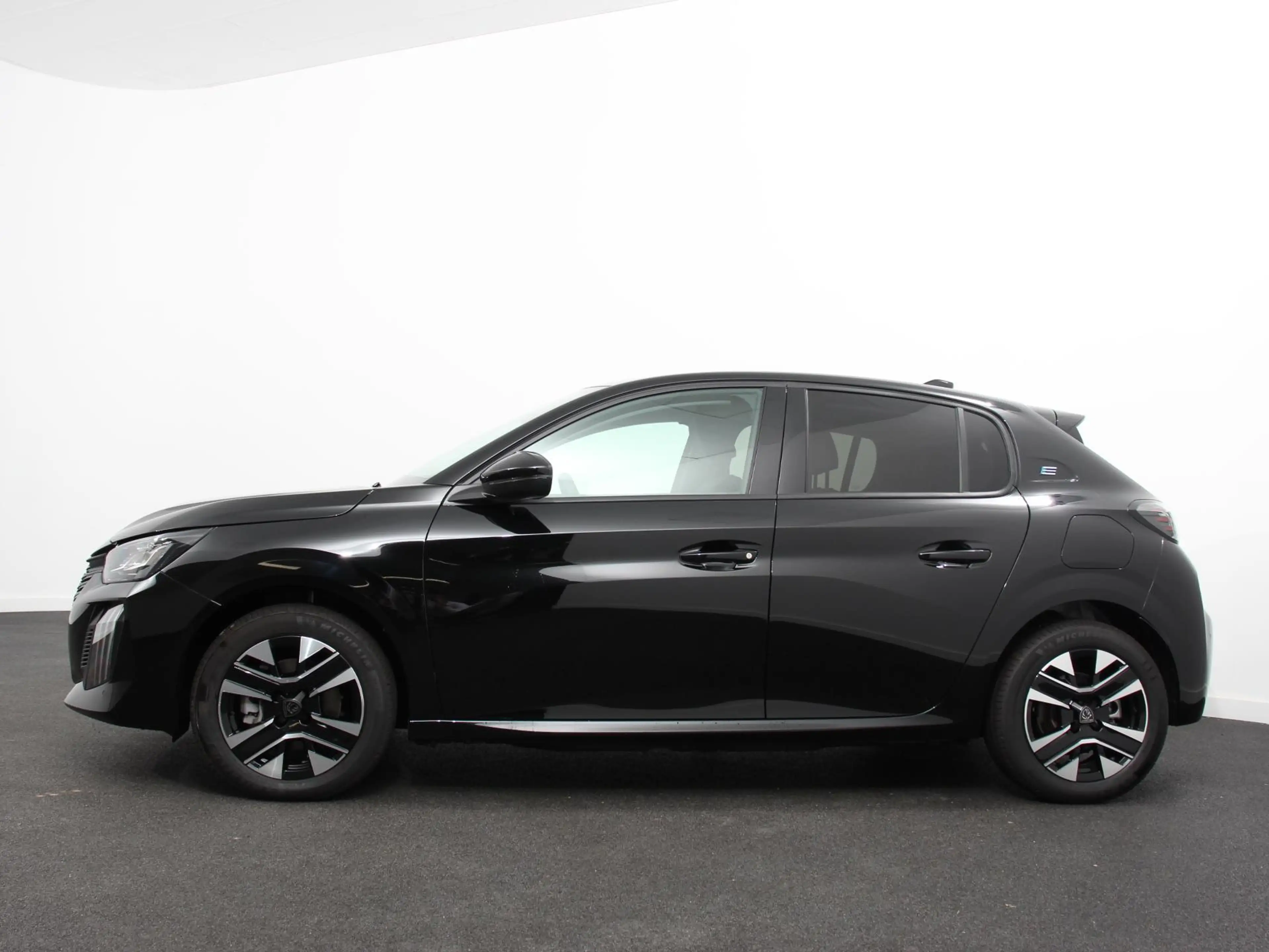 Peugeot e-208 EV Allure Pack 50 kWh Warmtepomp Navigatie Apple C — photo 7