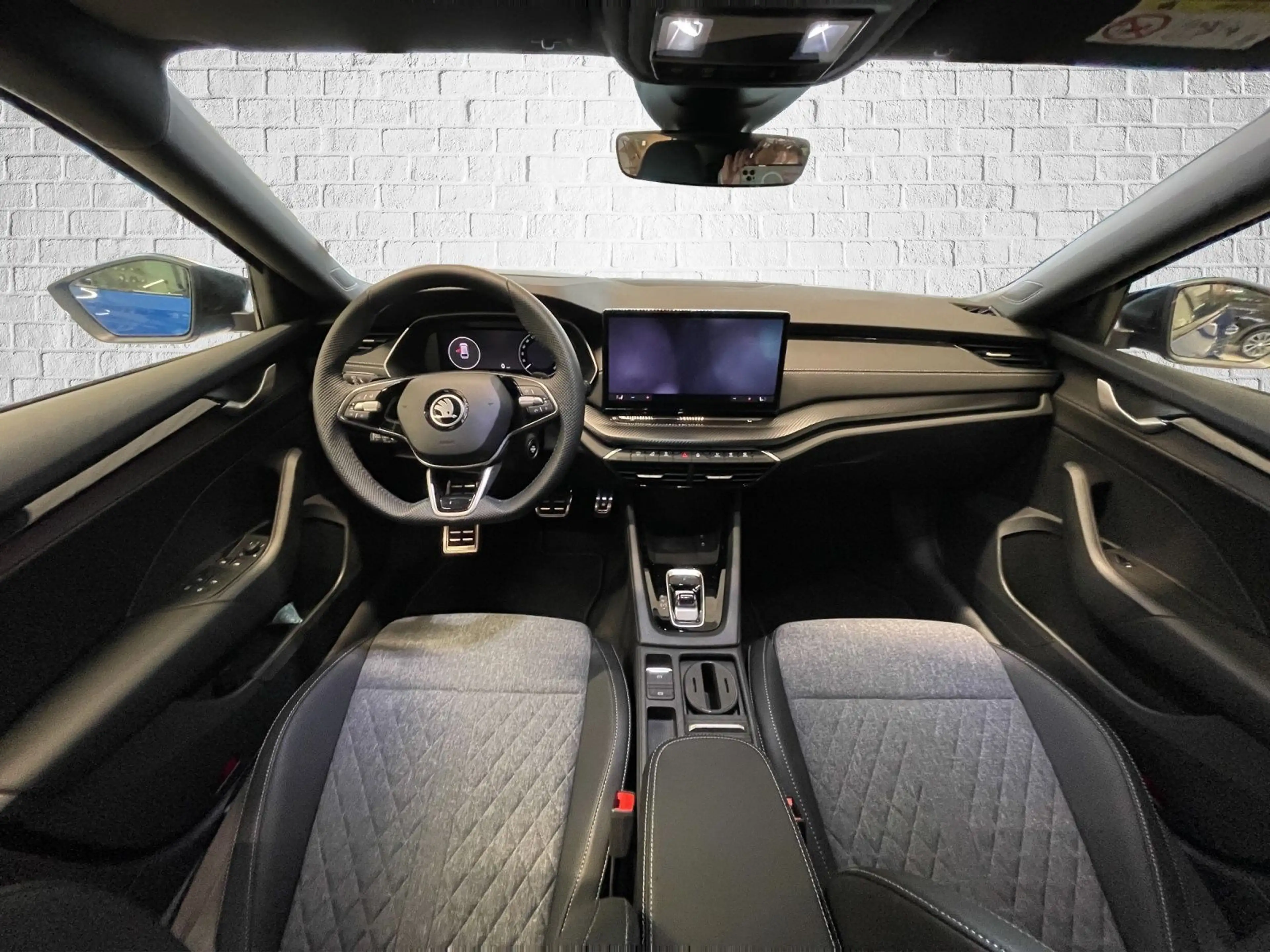 Skoda Octavia Combi 1.5 TSI mHEV DSG - Sportline — photo 10