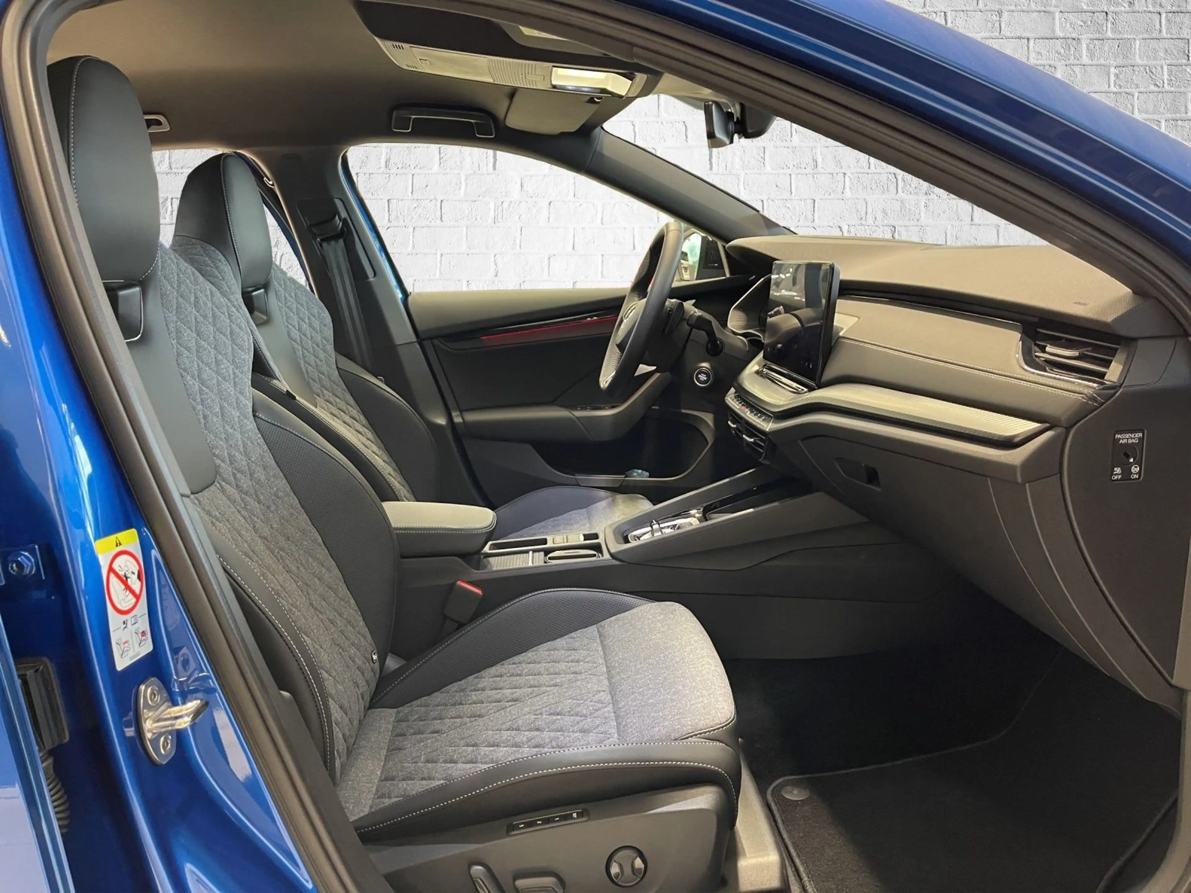 Skoda Octavia Combi 1.5 TSI mHEV DSG - Sportline — photo 14