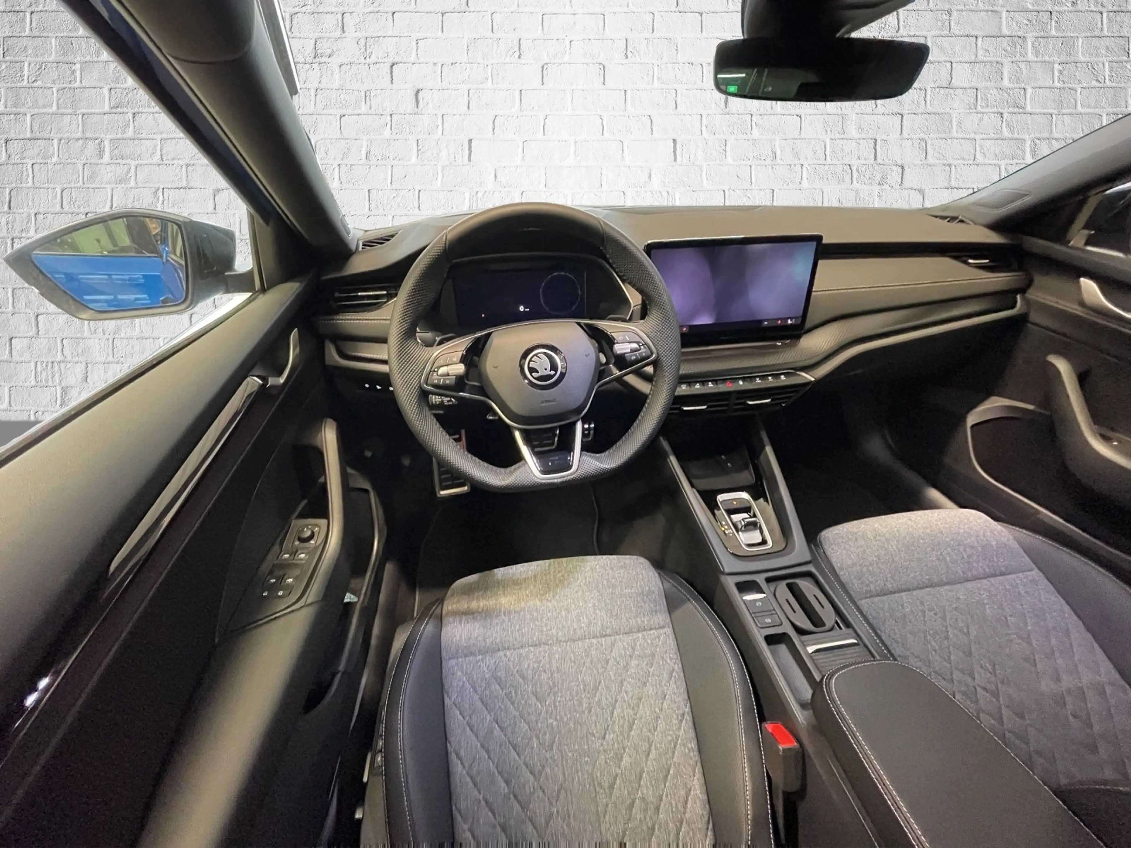 Skoda Octavia Combi 1.5 TSI mHEV DSG - Sportline — photo 9