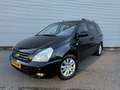 Kia Carnival 2.7 EX Automaat NAP 7Persoons Leer Trekhaak NW Dis Negro - thumbnail 1