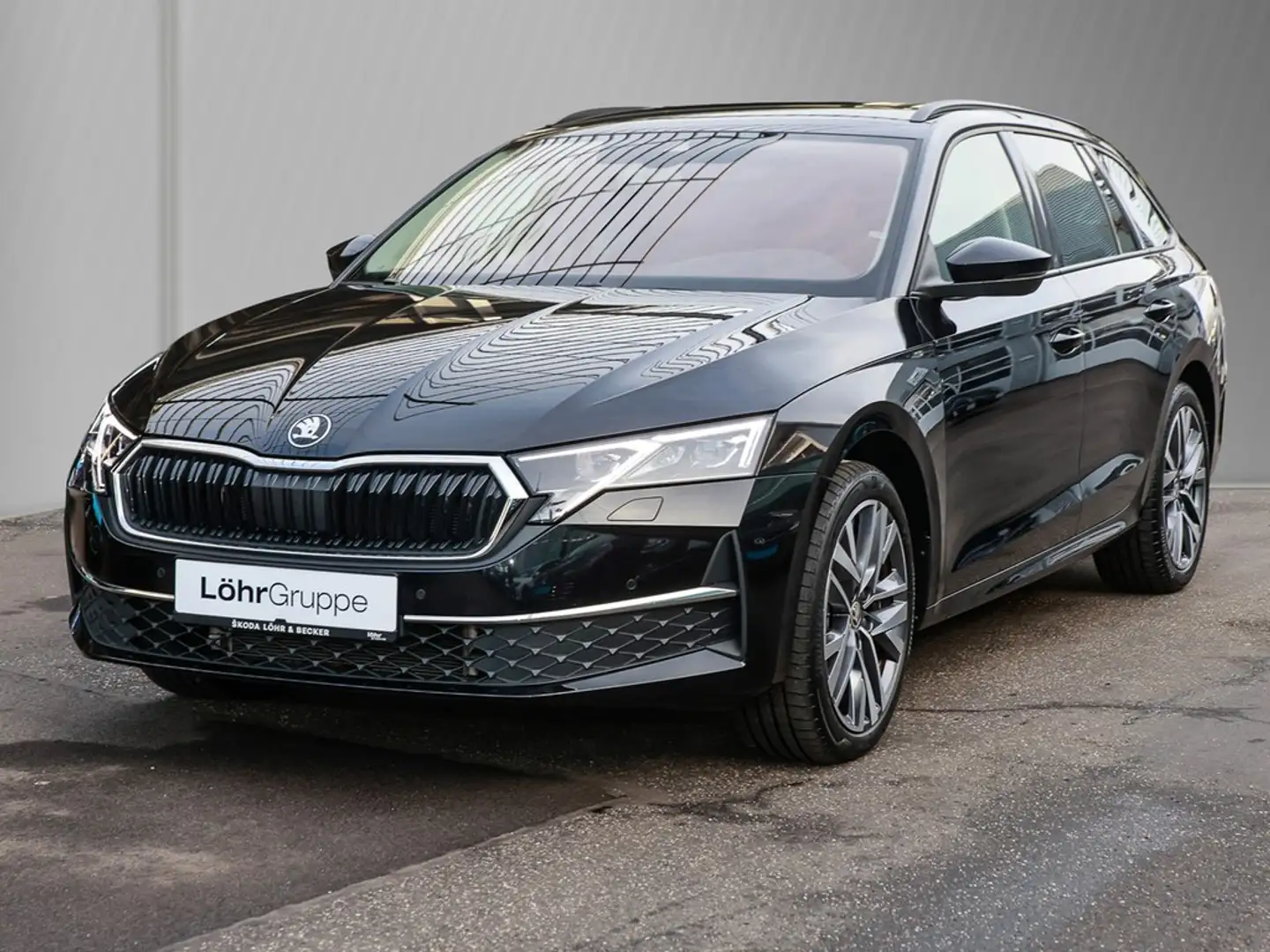 Skoda Octavia Combi 2.0 TDI DSG Selection AHK/Navi Schwarz - 2