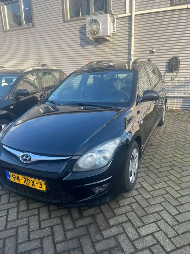 Hyundai i30 CW 1.4i i-Drive Airco Trekhaak APK 12-2025 rv sche Zwart - 1