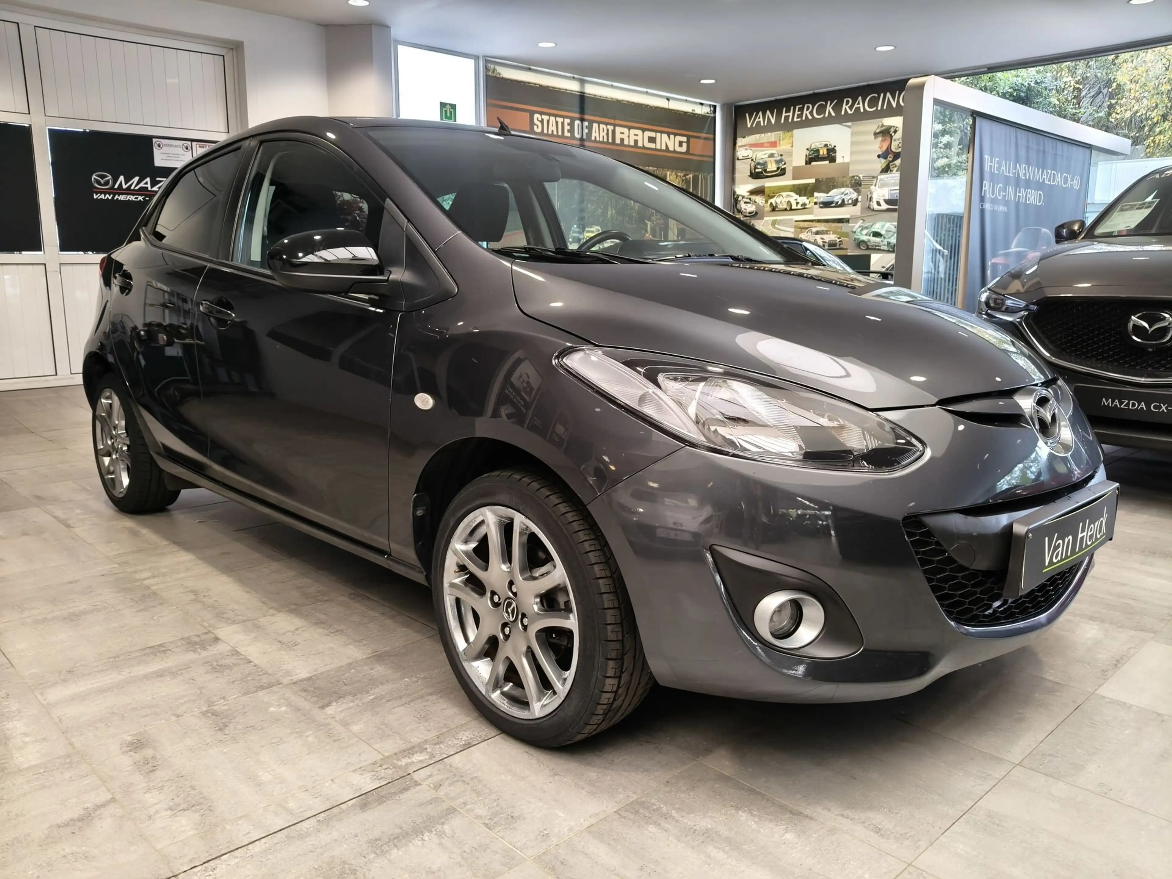 Mazda 2 1.3i Sportnavigator — photo 7