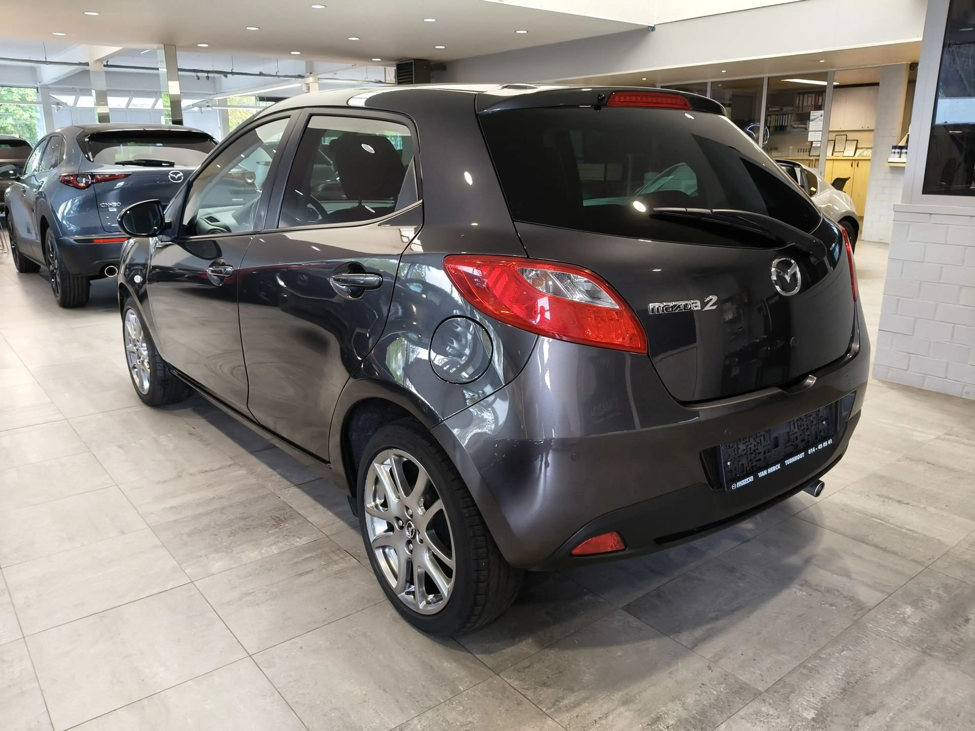 Mazda 2 1.3i Sportnavigator — photo 4