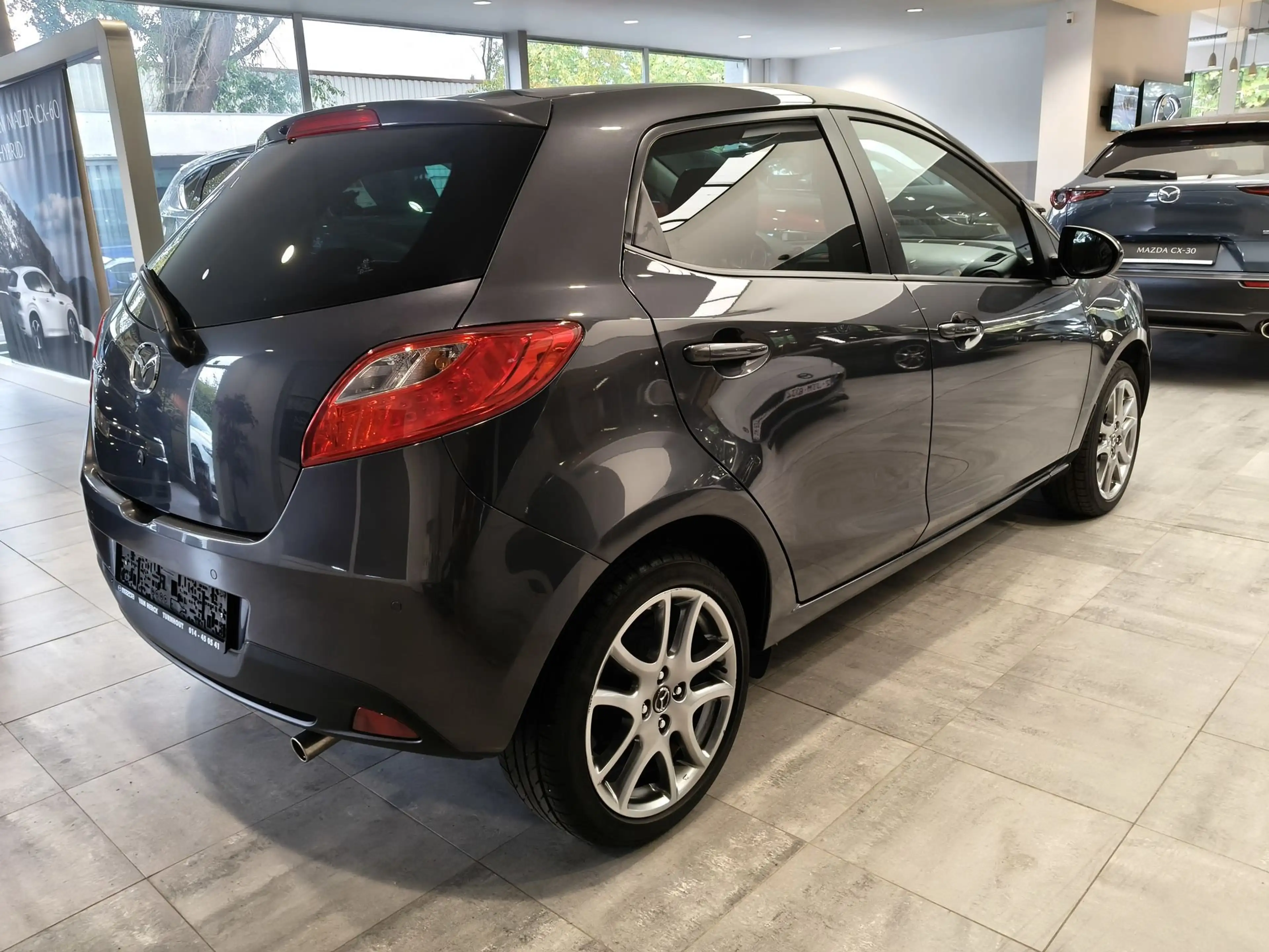 Mazda 2 1.3i Sportnavigator — photo 6