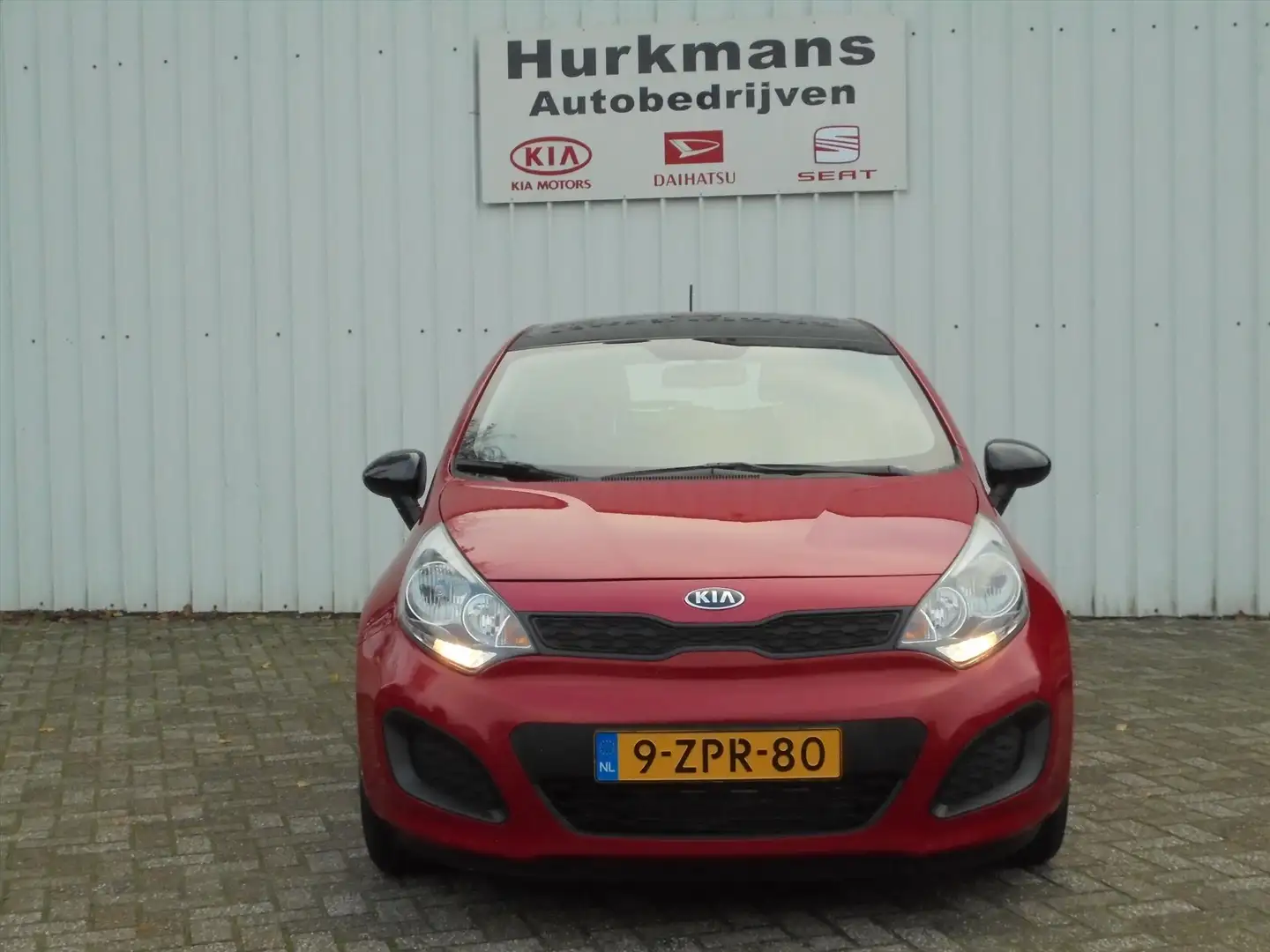 Kia Rio 1.2i COMFORTLINE 1e EIG NL-AUTO 19.790 KM !! Rood - 2