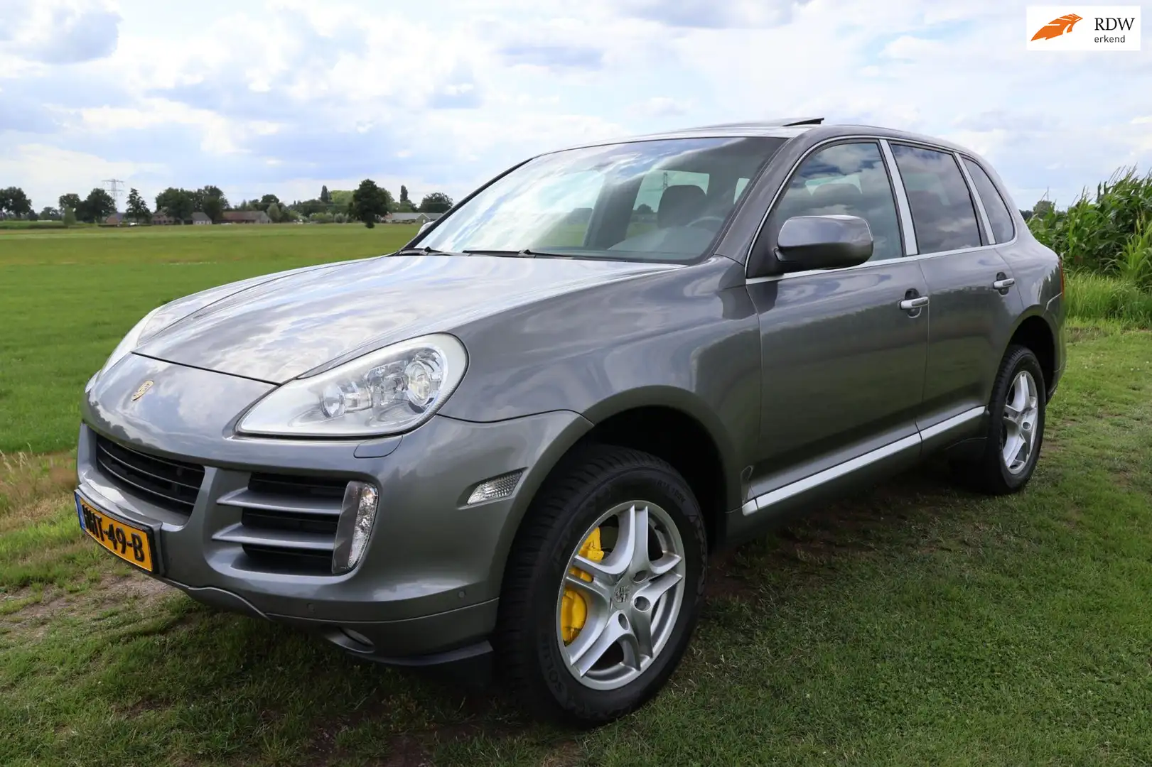 Porsche Cayenne 3.6 V6|YOUNGTIMER|Pano-dak|APK-Nieuw|Bluetooth|Lee Grijs - 1