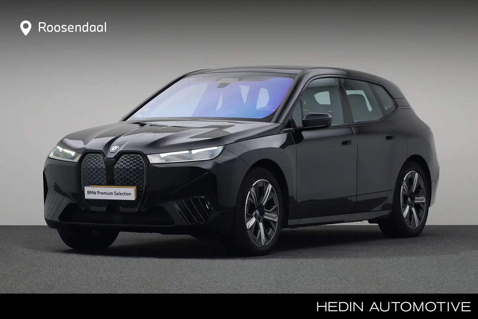 BMW iX xDrive40 High Executive 77 kWh | 4W besturing | Lu Zwart - 1