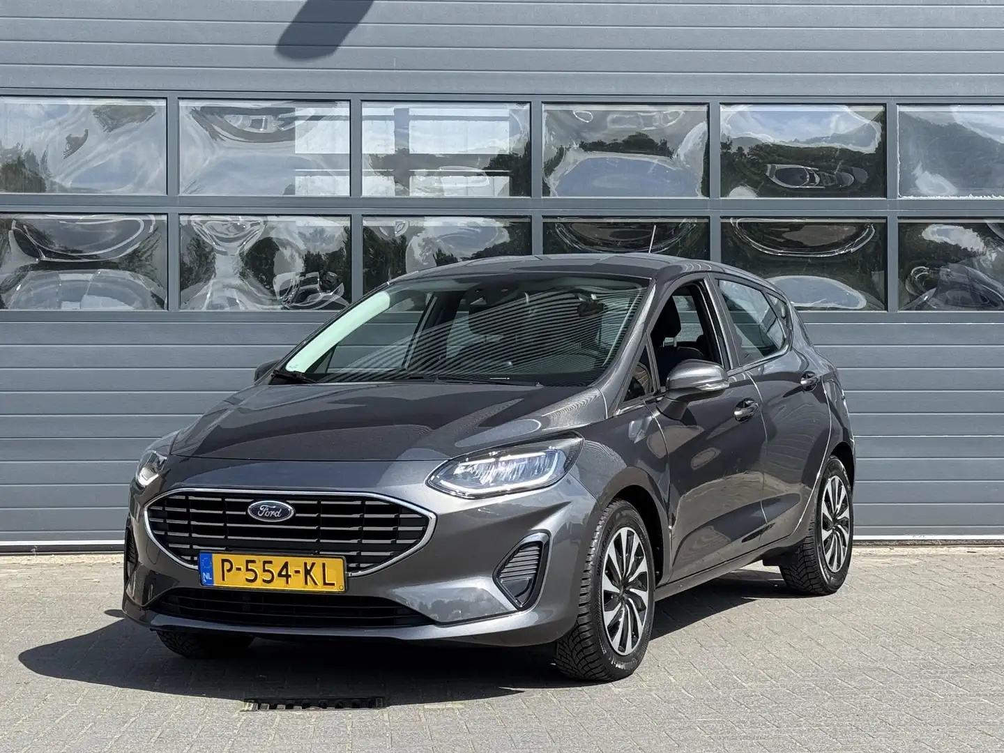 Ford Fiesta 1.0 ECOBOOST HYBRID TITANIUM I CARPLAY I CRUISE CO Grijs - 1