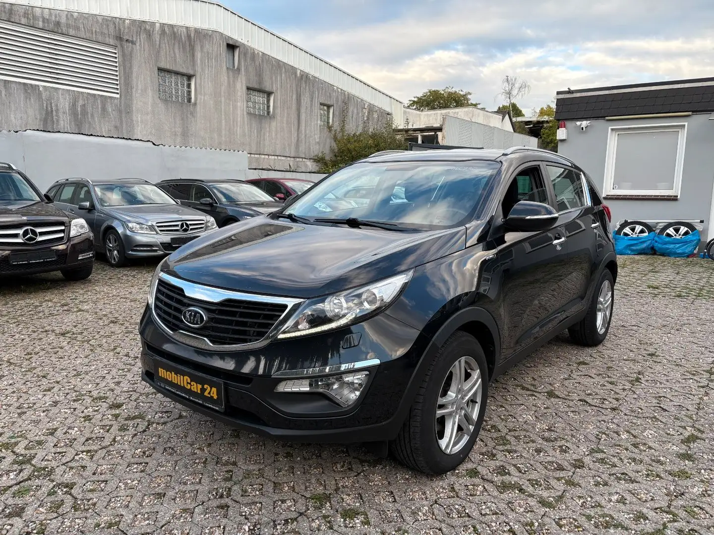 Kia Sportage 2,0 CRDI Vision 4WD SCHECKHEFT TOP Schwarz - 1