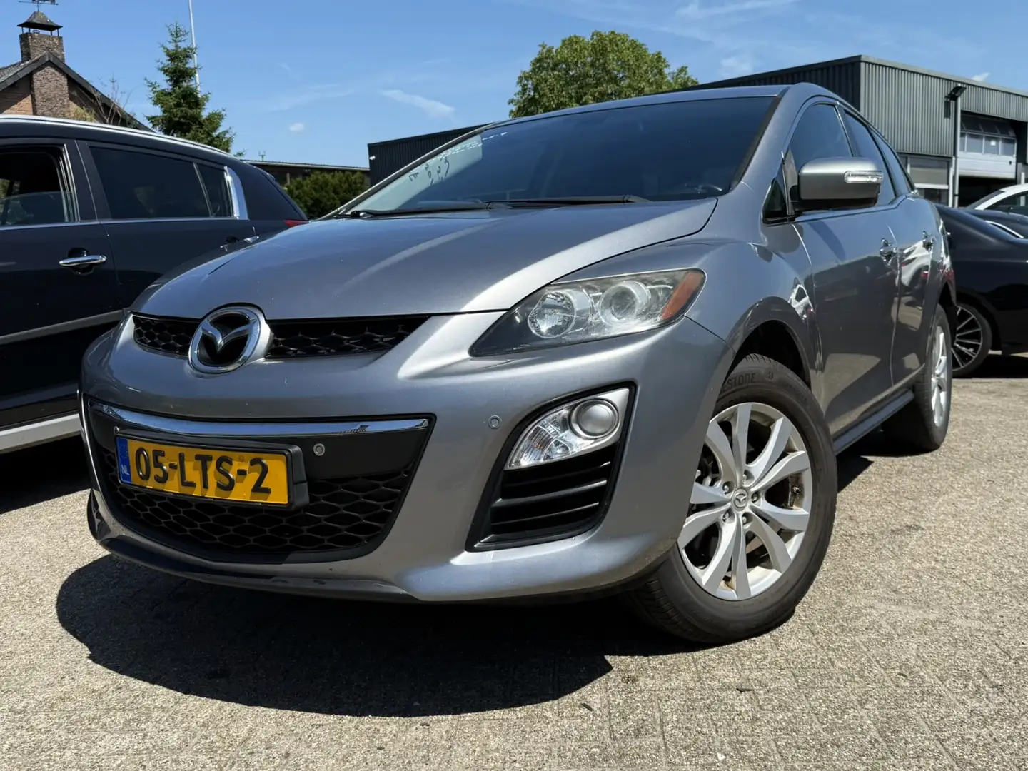 Mazda CX-7 2.2 CiTD BUSINESS NAVI/CAMERA/ALCANTARA/TREKHAAK Grijs - 1