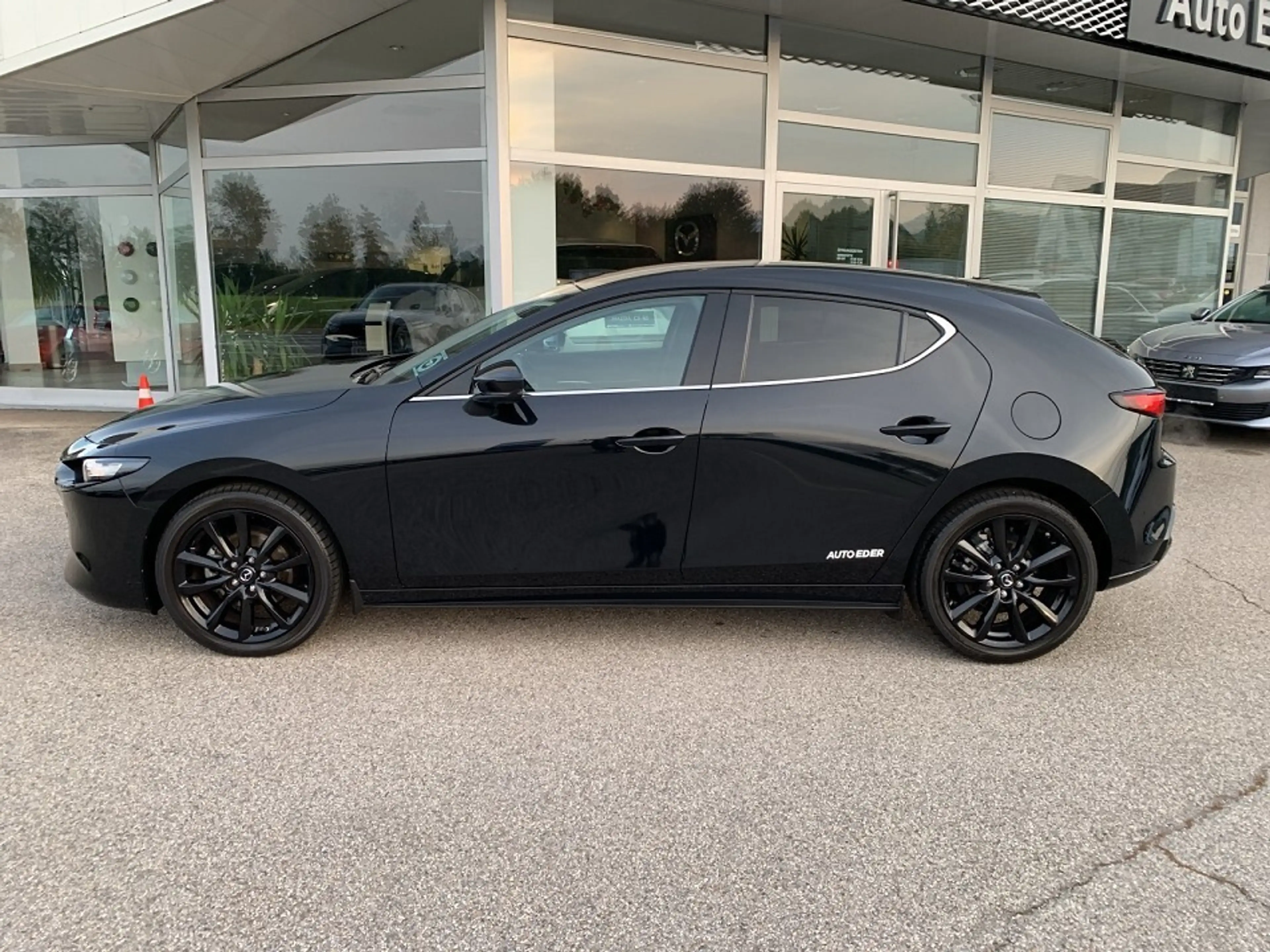 Mazda 3 Mazda3 e-Skyactiv-G122 Homura — photo 11