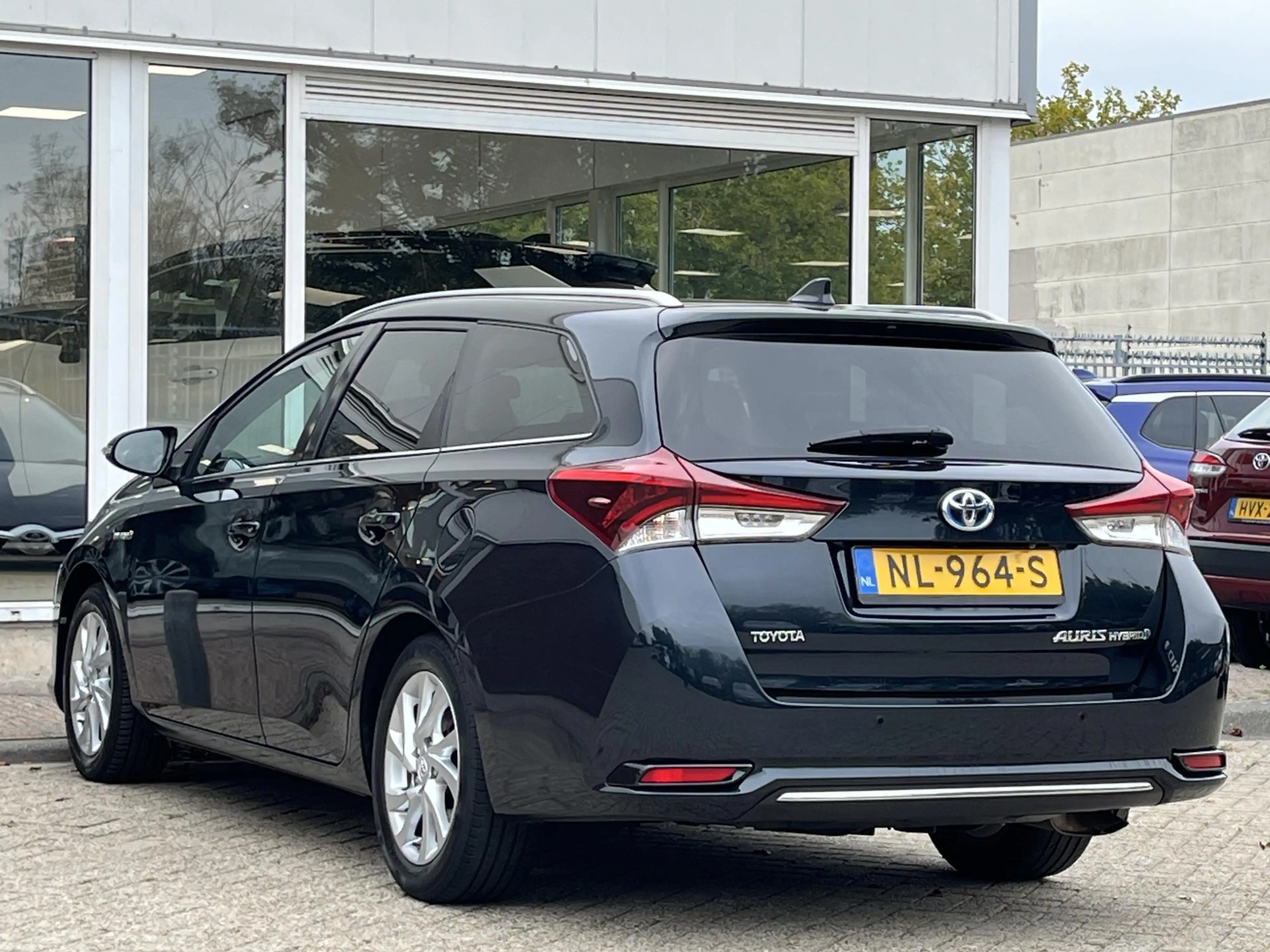 Toyota Auris Touring Sports 1.8 Hybrid Executive / Panoramadak — photo 11