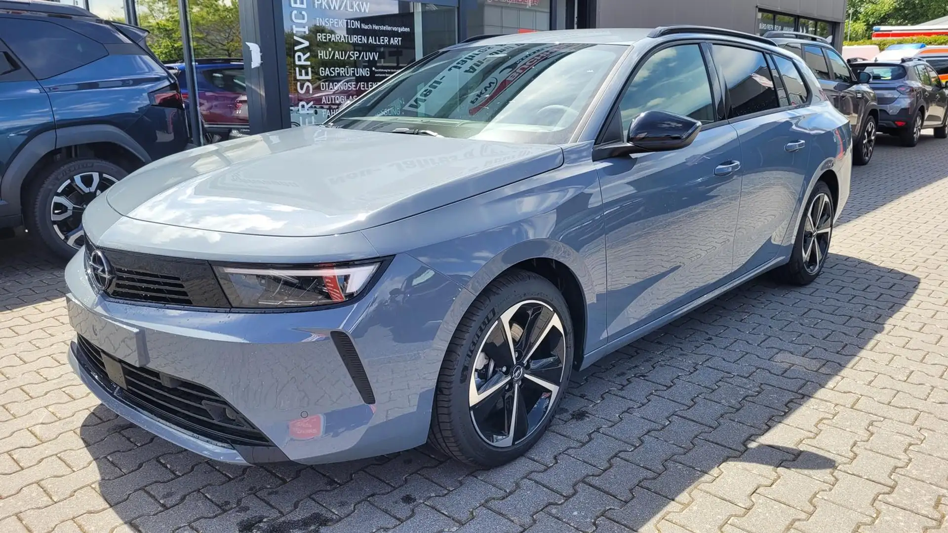 Opel Astra Caravan Edition  ST*LED*Navi*Shzg*Lhzg*PDCv+h*1... Grau - 1