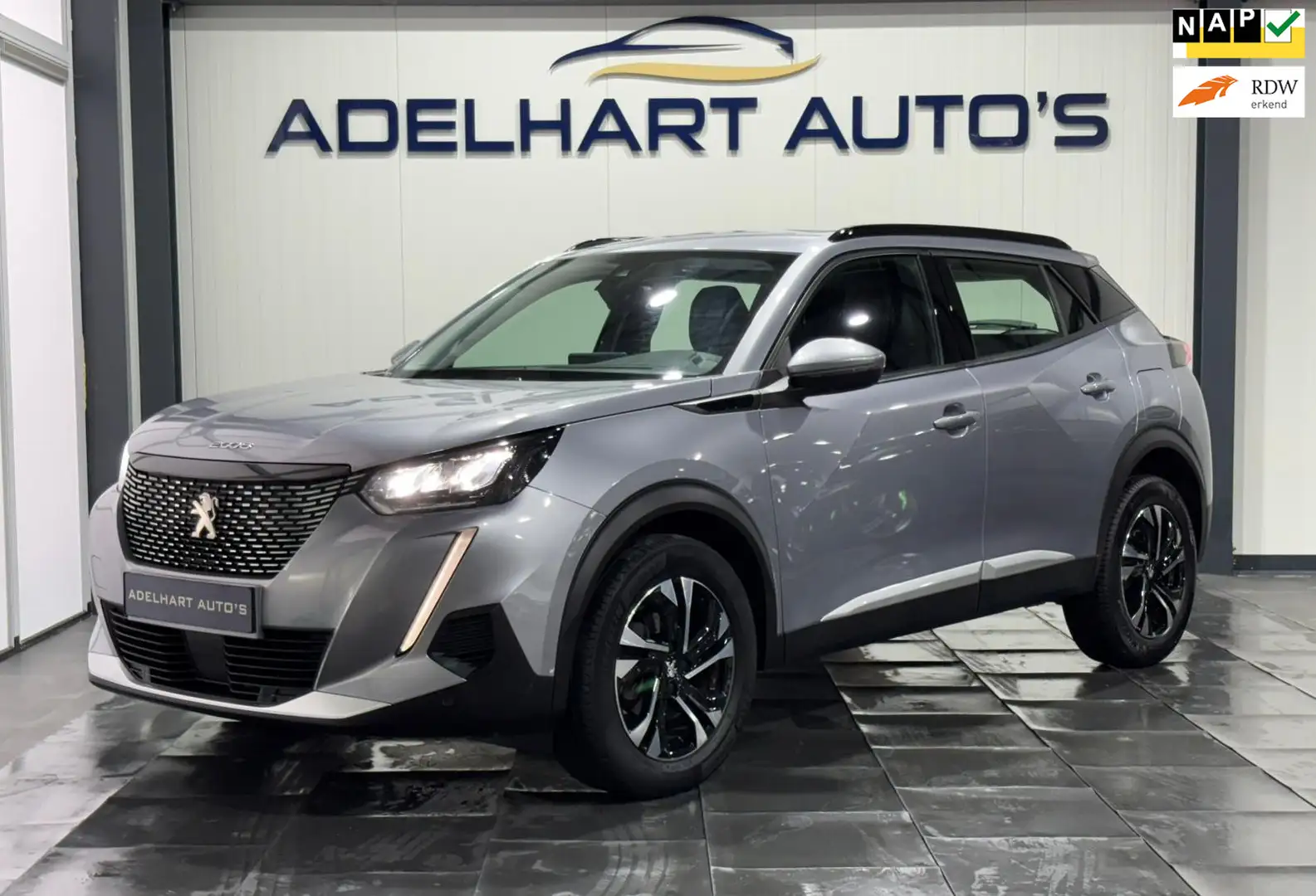 Peugeot 2008 1.2 PureTech Allure / Navigatie full map / Camera Zilver - 1