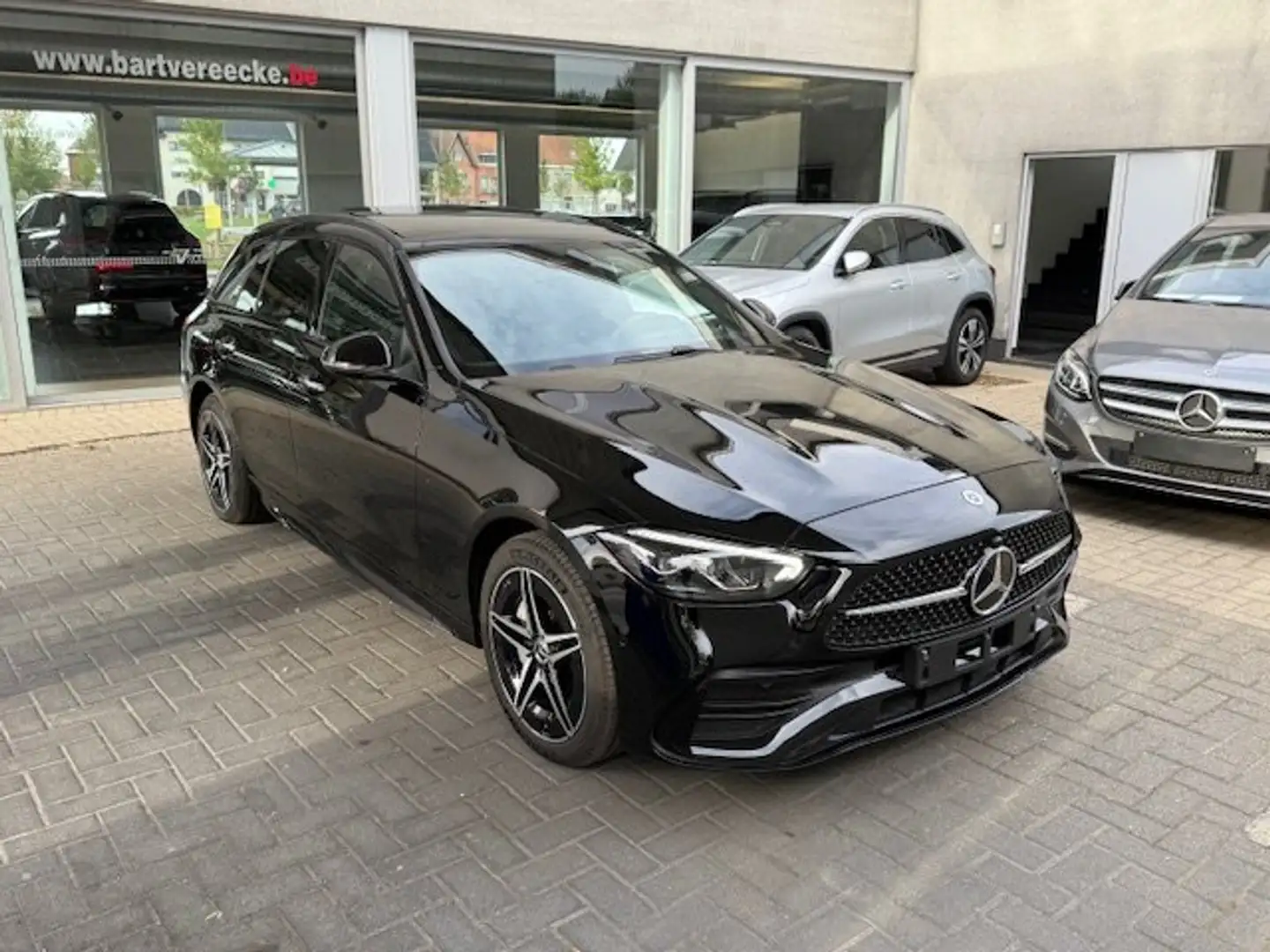 Mercedes-Benz C 300 Amg-Pano-NightP-Cam-Dodeh-Memory-CarPlay-KeyLes Zwart - 2