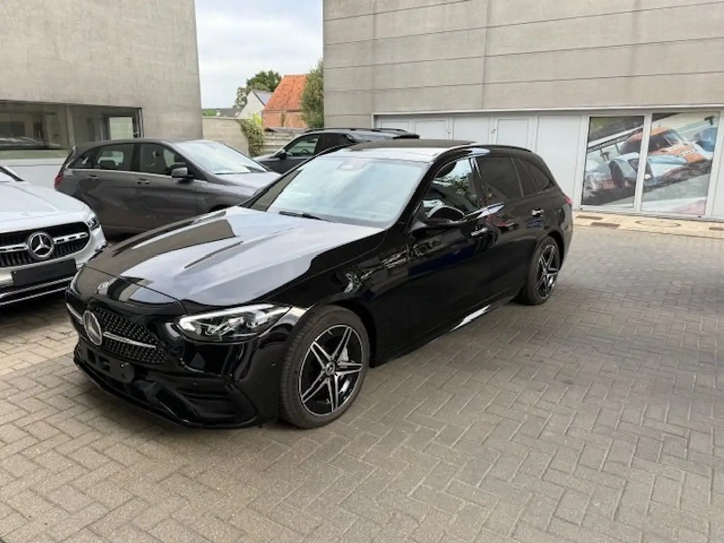 Mercedes-Benz C 300 Amg-Pano-NightP-Cam-Dodeh-Memory-CarPlay-KeyLes Zwart - 1