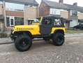 Jeep Wrangler 4.0 high output offroad, sperren 37s Geel - thumbnail 1