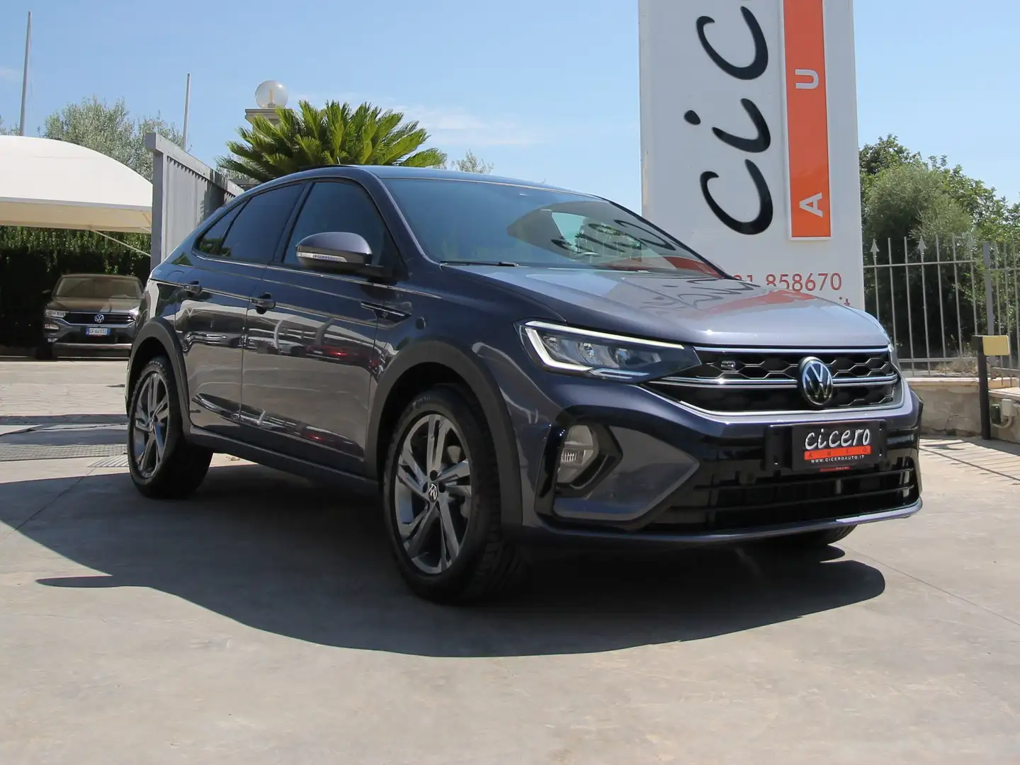 Volkswagen Taigo 1.0 tsi R-Line 110cv DSG | 60.000KM | 2022 Gris - 1