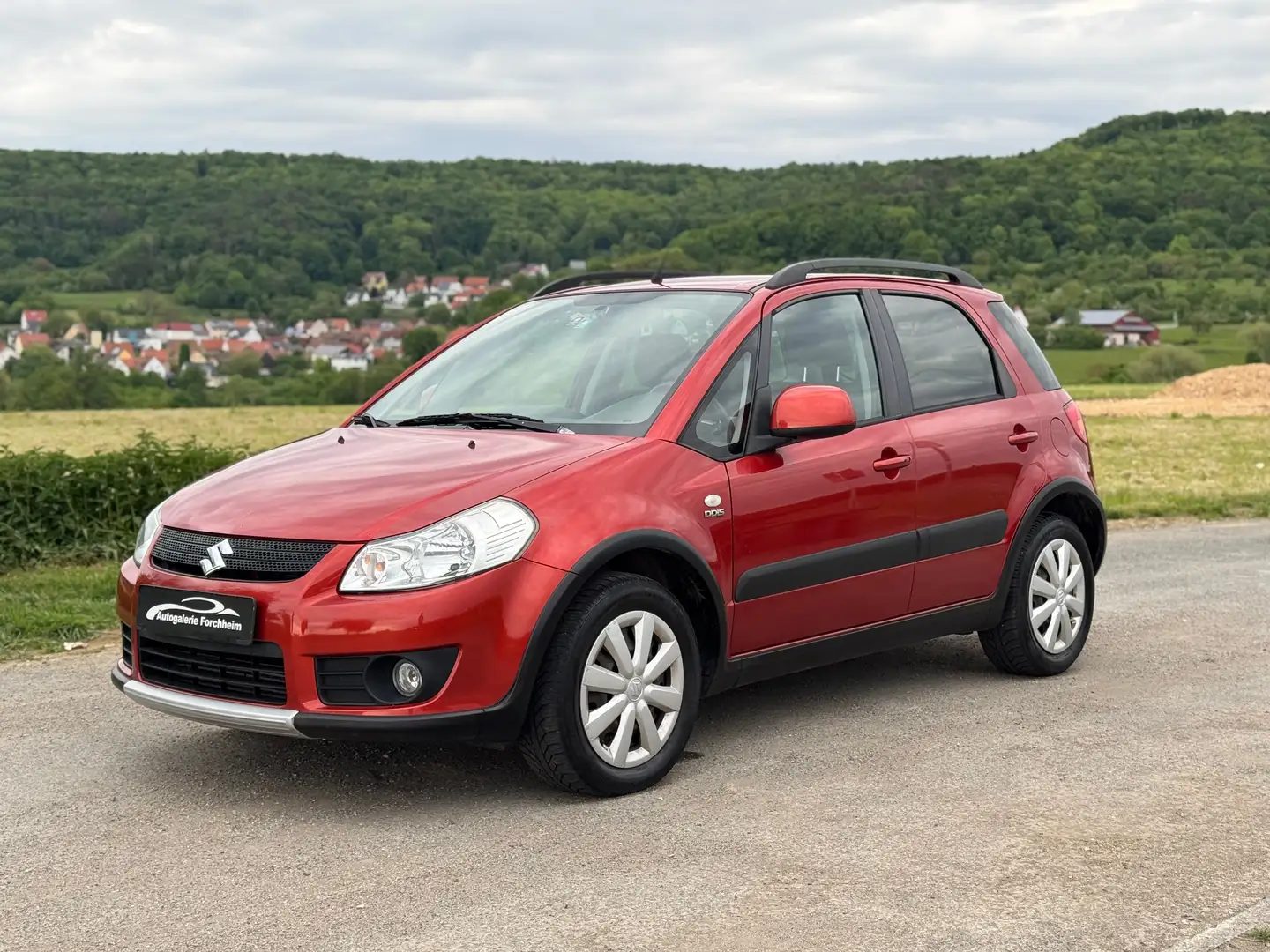 Suzuki SX4 1.9 DDiS DPF 4x4 AHK*Navi*Keyless*Klima*Shz* Orange - 1