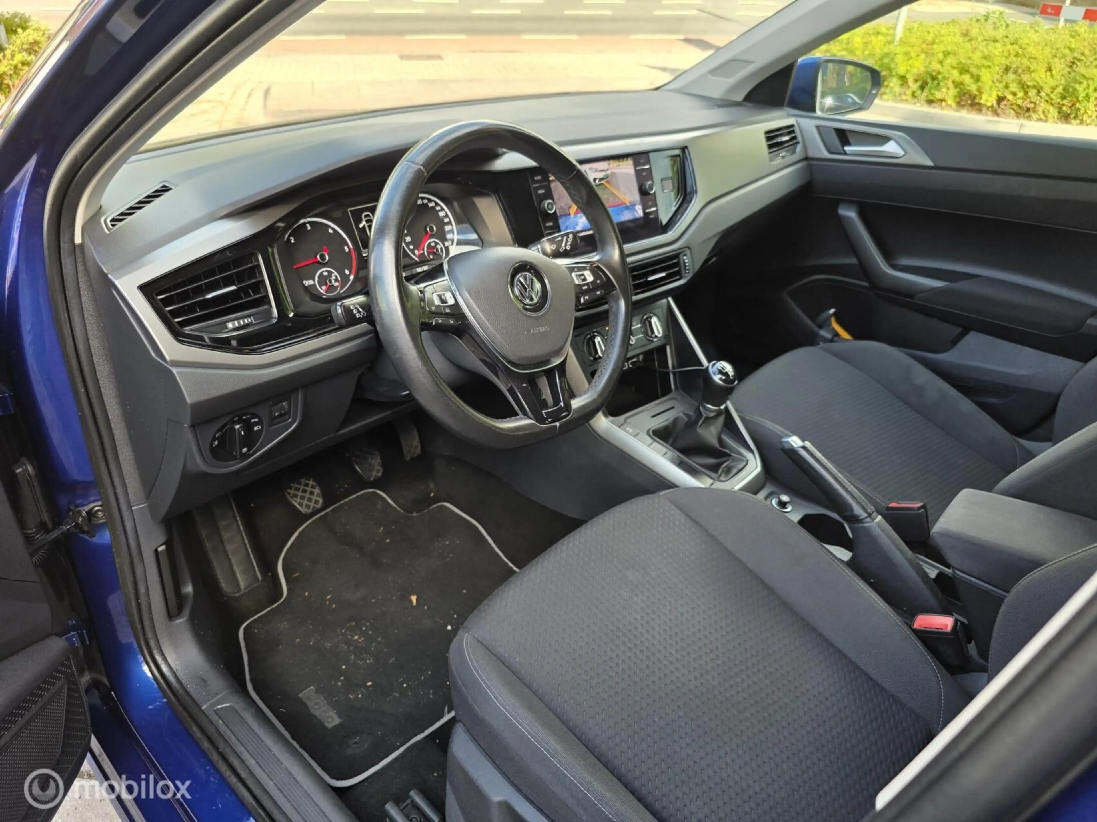 Volkswagen Polo 1.6 TDI Comfortline Business Dealer onderhouden — photo 10