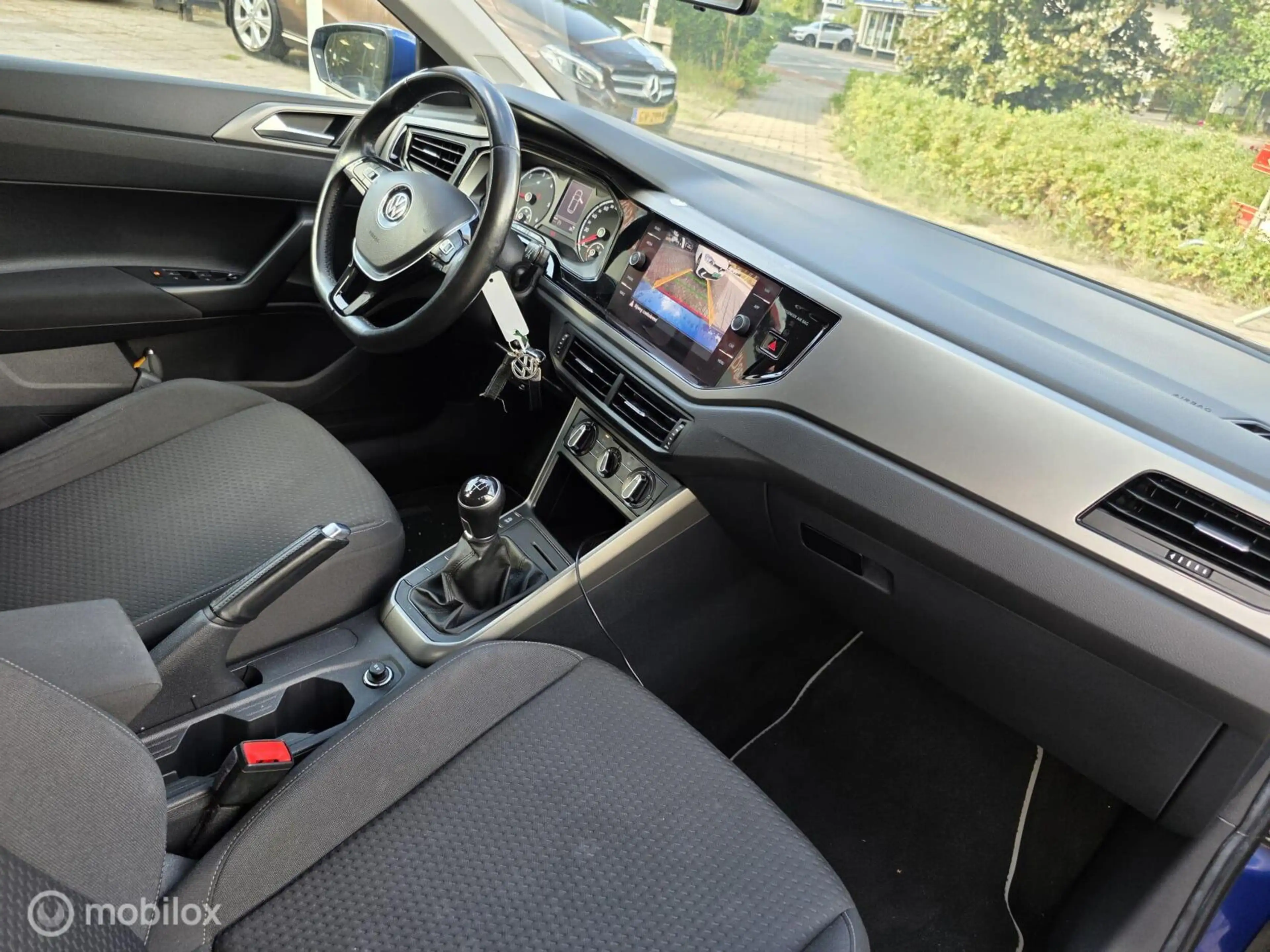Volkswagen Polo 1.6 TDI Comfortline Business Dealer onderhouden — photo 12