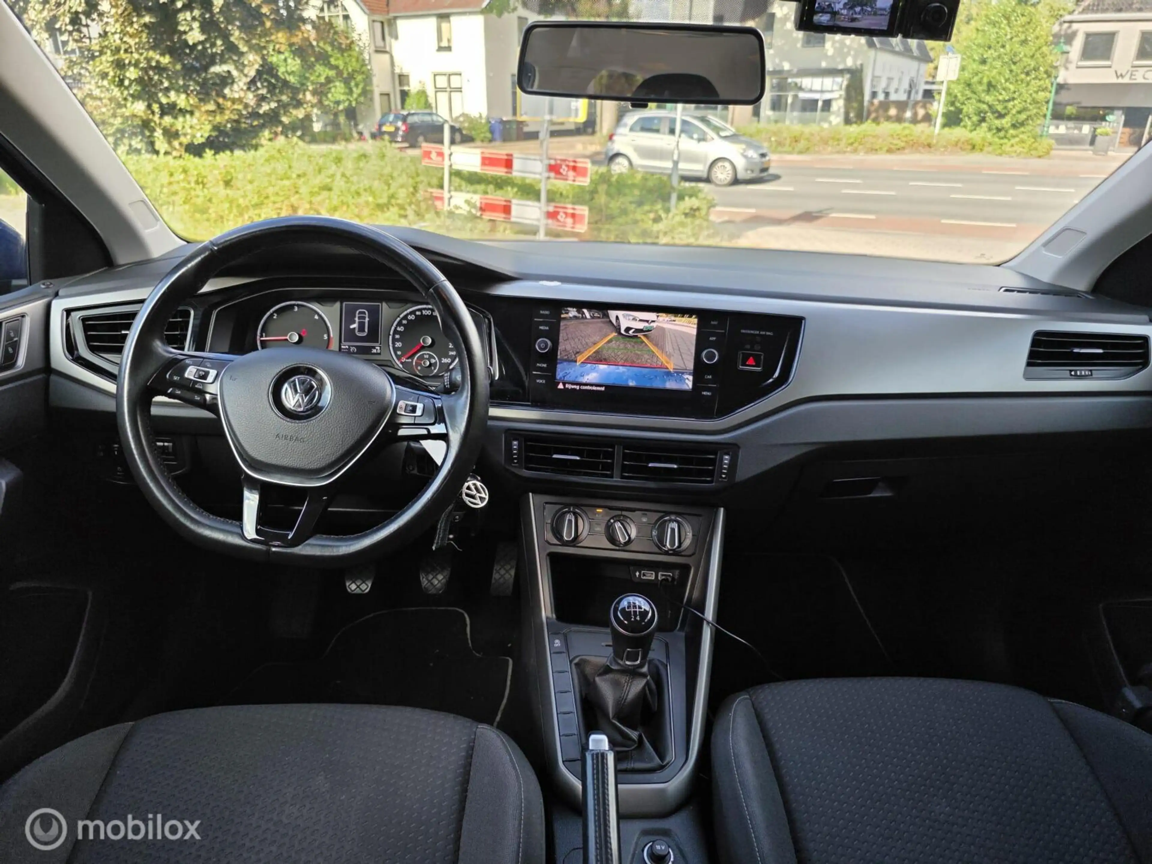 Volkswagen Polo 1.6 TDI Comfortline Business Dealer onderhouden — photo 8