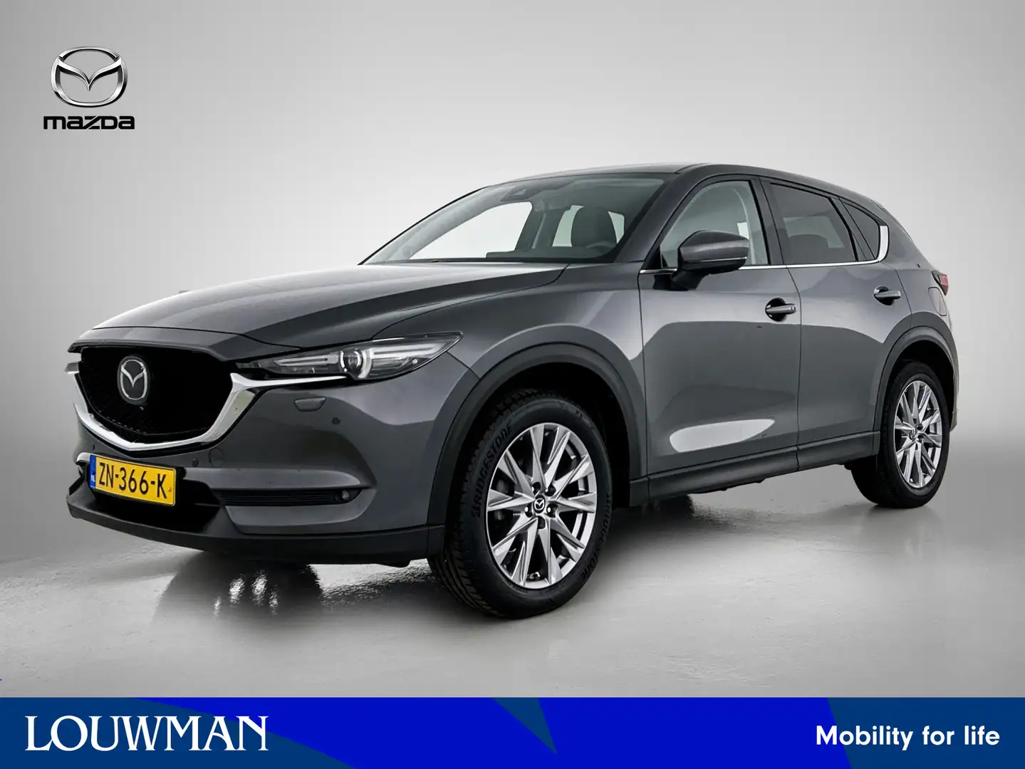Mazda CX-5 2.0 SkyActiv-G 165 Luxury | Op afspraak beschikbaa Grijs - 1