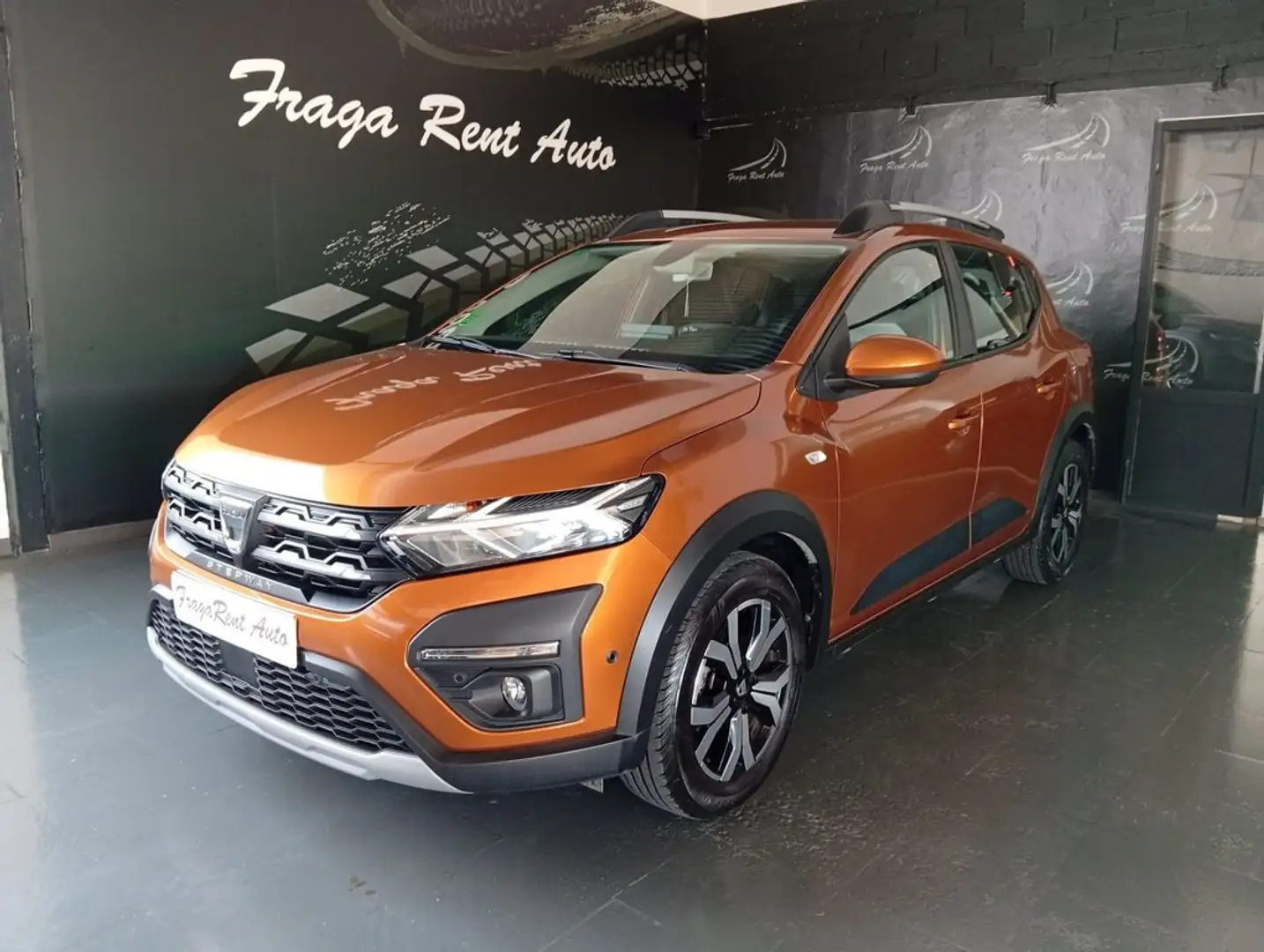 Dacia Sandero Stepway TCe Comfort 67kW Naranja - 1