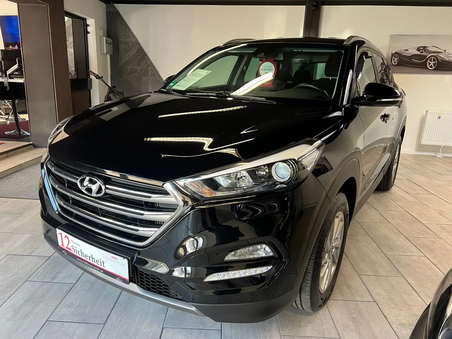 Hyundai TUCSON 2.0 CRDi 100kW Style 4WD Schwarz - 1