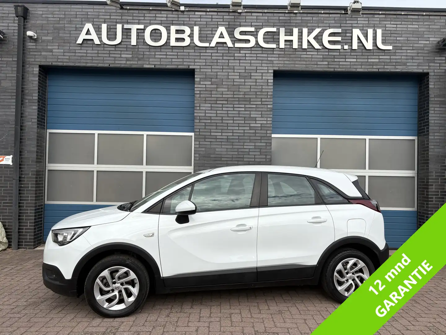 Opel Crossland X 1.2 Turbo Edition, airco, navi, apple/android Wit - 1