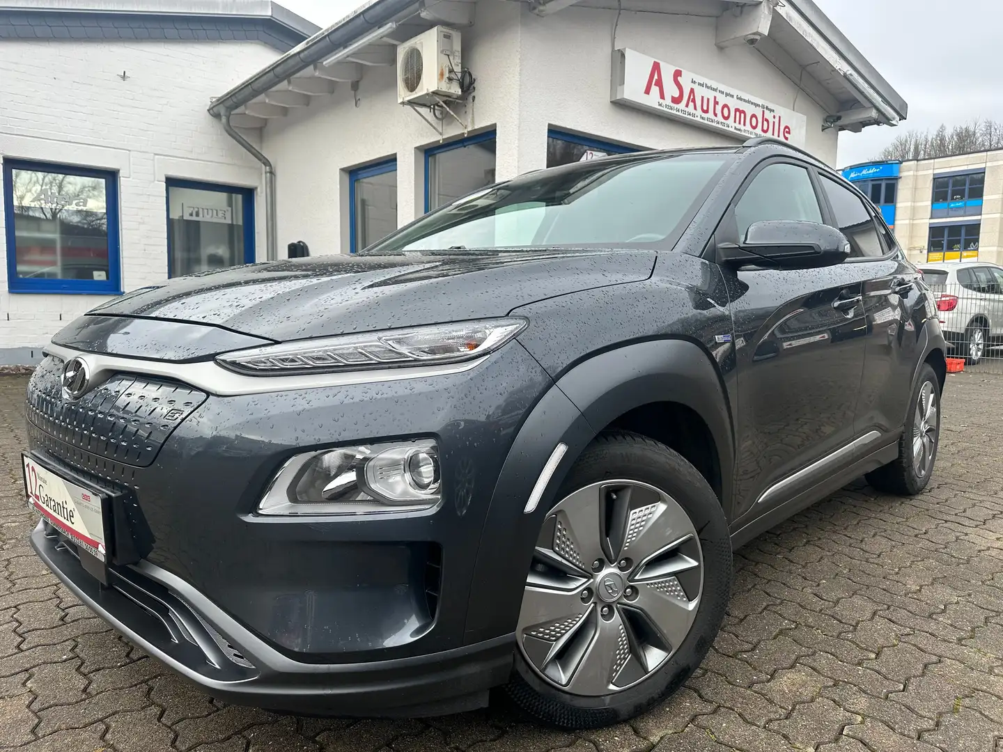 Hyundai KONA Elektro St&St+1.HAND+NAVI+KLIMATRONIK+PDC+KAMERA Grau - 1