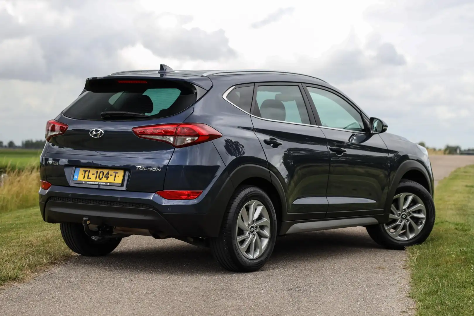 Hyundai TUCSON 1.6 GDi Comfort ✅ Carplay ✅ Trekhaak ✅ Camera Blauw - 2
