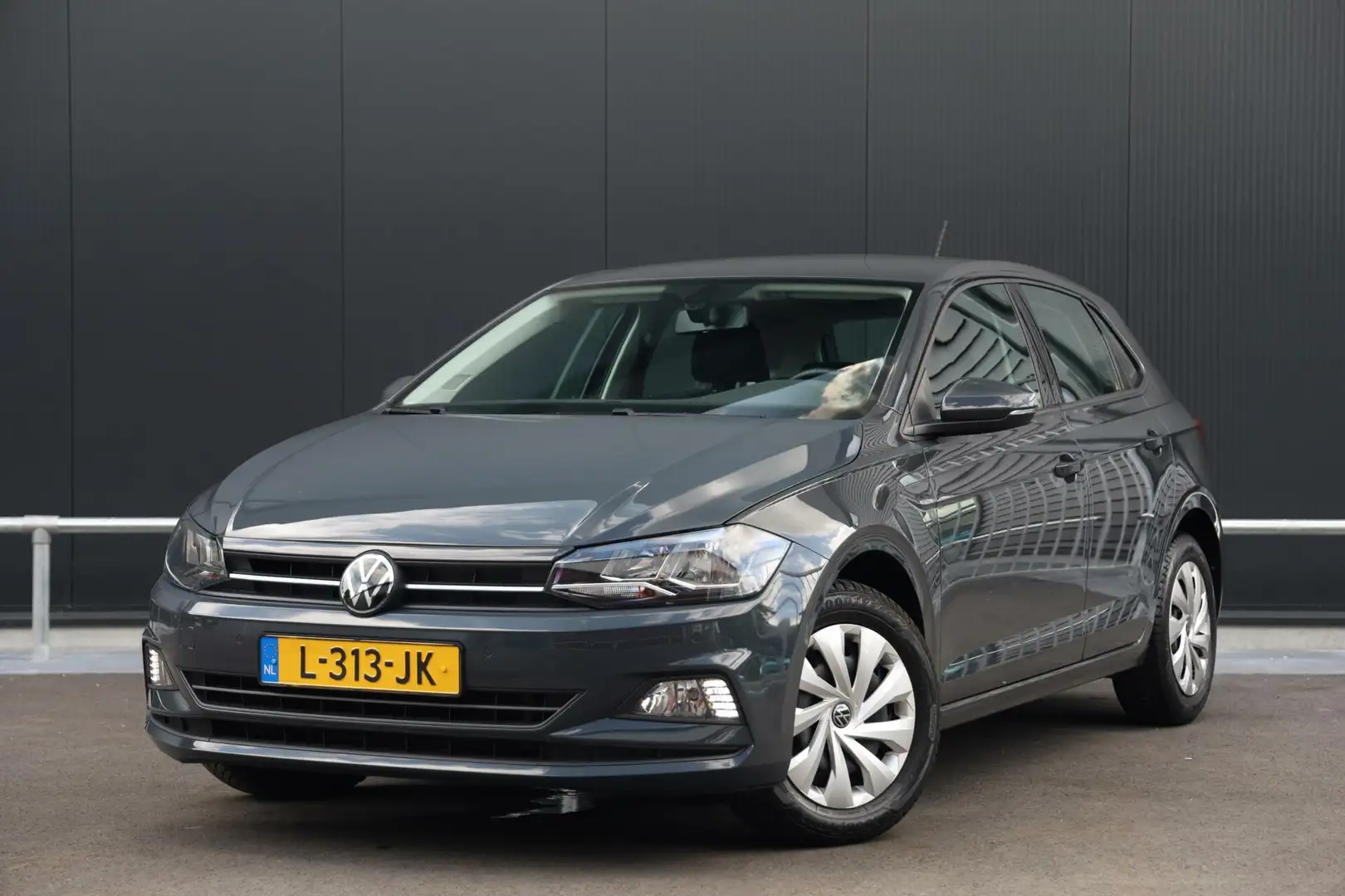 Volkswagen Polo 1.0 TSI 95pk Comfortline Business Navi Clima ACC D Grijs - 1