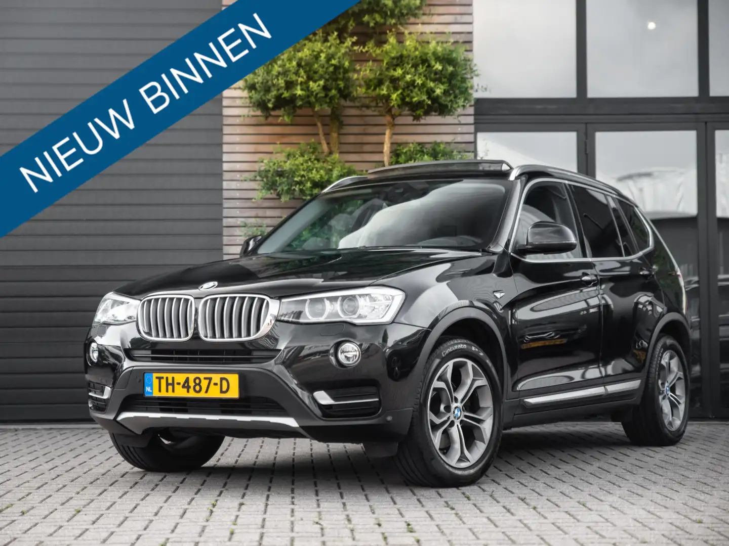 BMW X3 xDrive20i High Executive Pano Leer H&K Trekhaak Zwart - 1