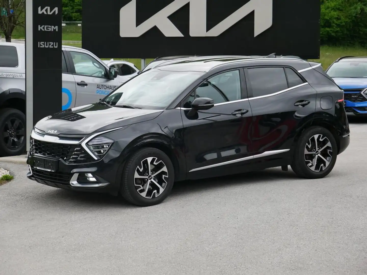 Kia Sportage 1,6 TGDI 48V Gold AWD DCT + Anhängerkuppl Schwarz - 1
